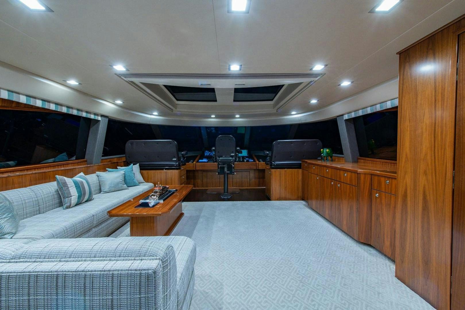 a room with a bed and a desk aboard OBSESSION Yacht for Sale