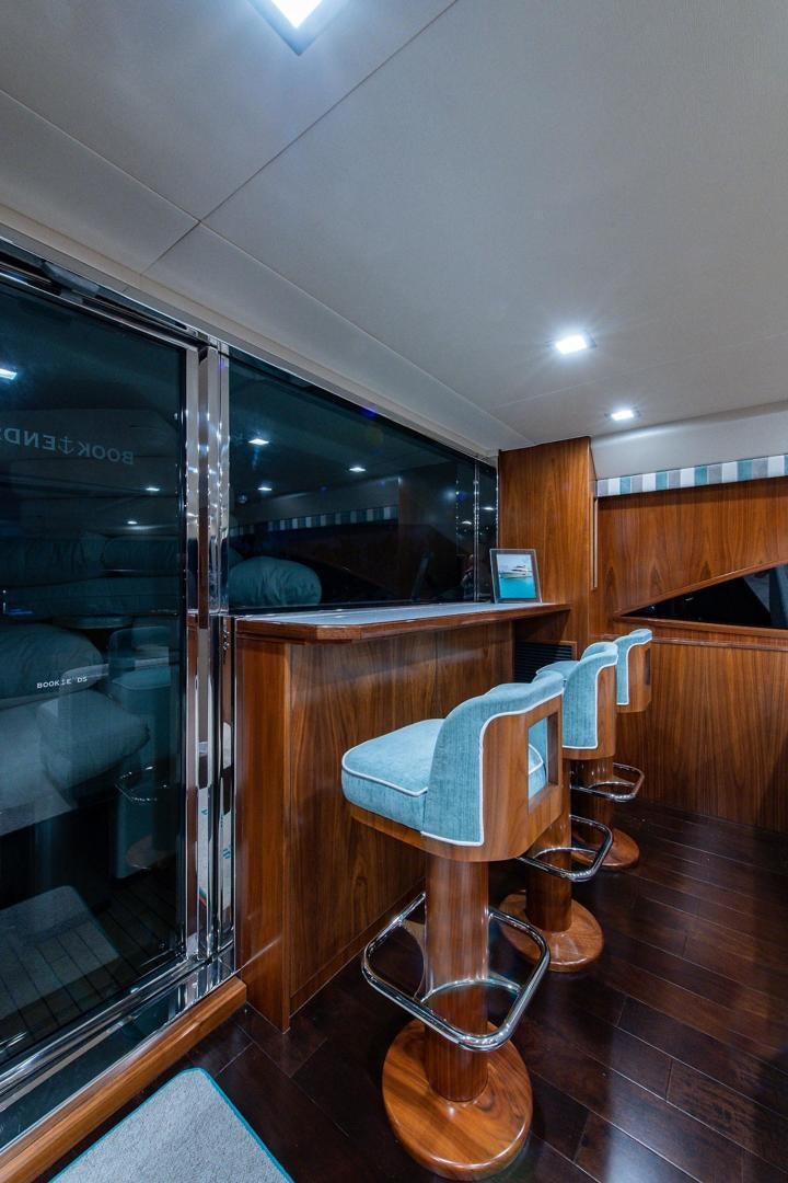 a chair in a room aboard OBSESSION Yacht for Sale