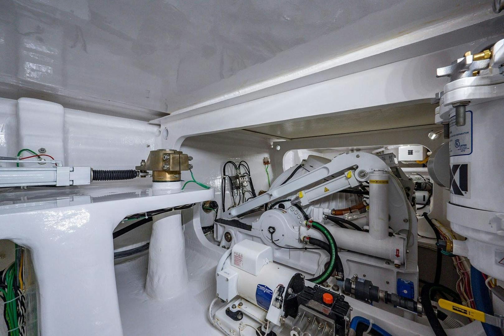 a room with white pipes and pipes aboard OBSESSION Yacht for Sale