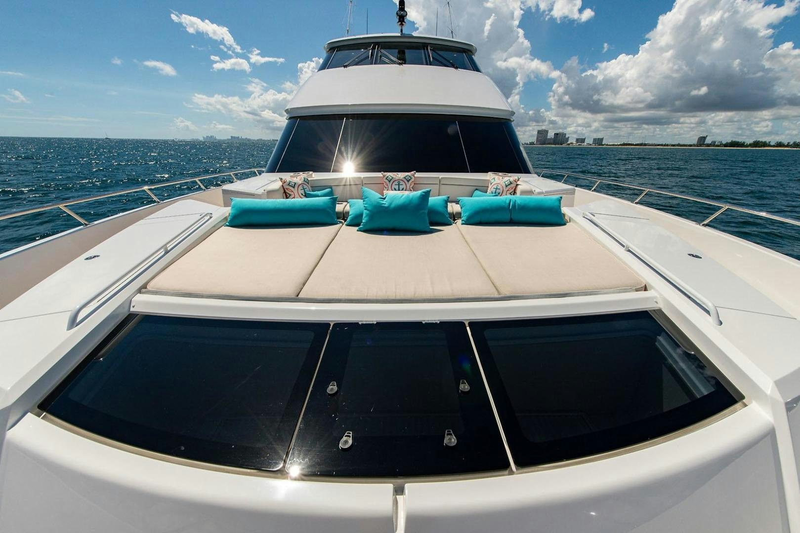 a boat on the water aboard OBSESSION Yacht for Sale