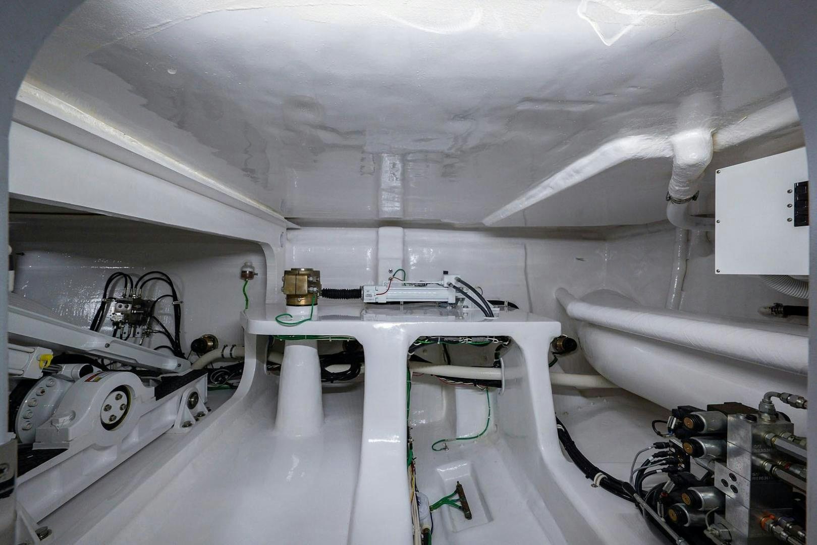 a room with a sink and machinery aboard OBSESSION Yacht for Sale