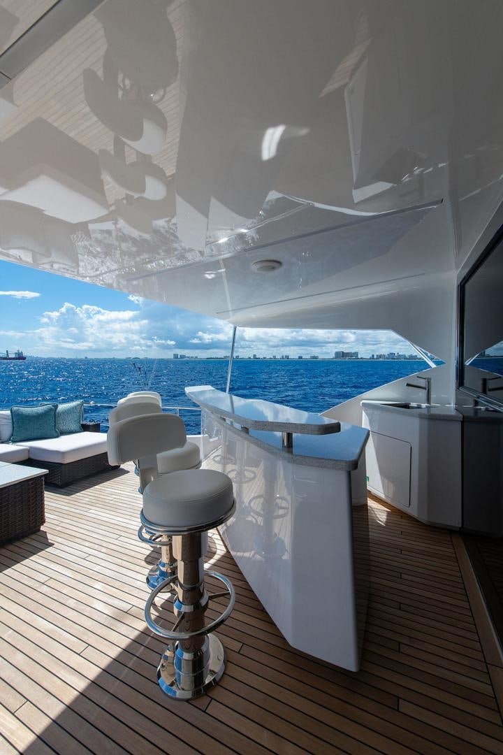 a room with a view of the ocean and the ocean aboard OBSESSION Yacht for Sale