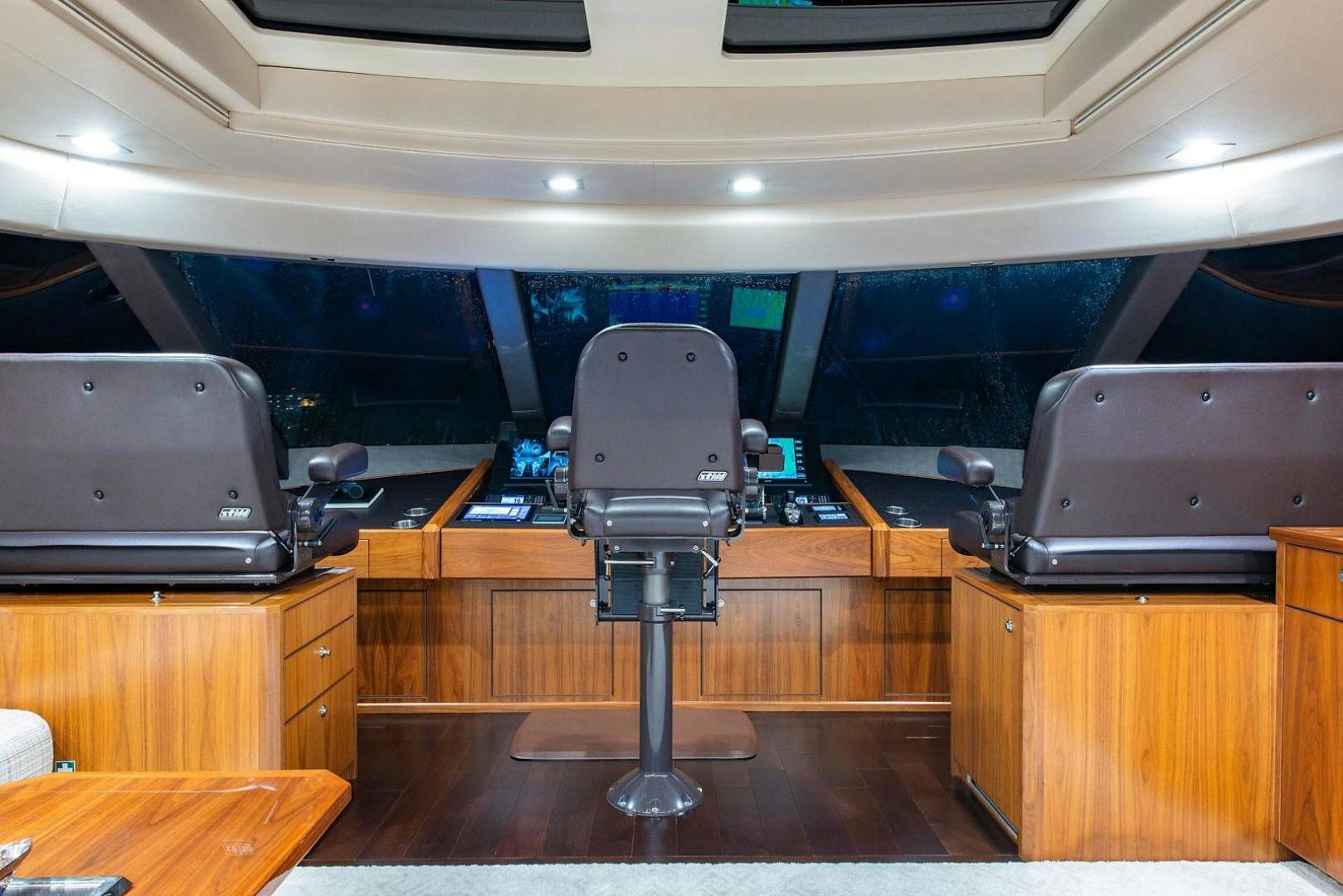 a room with a desk and a chair aboard OBSESSION Yacht for Sale
