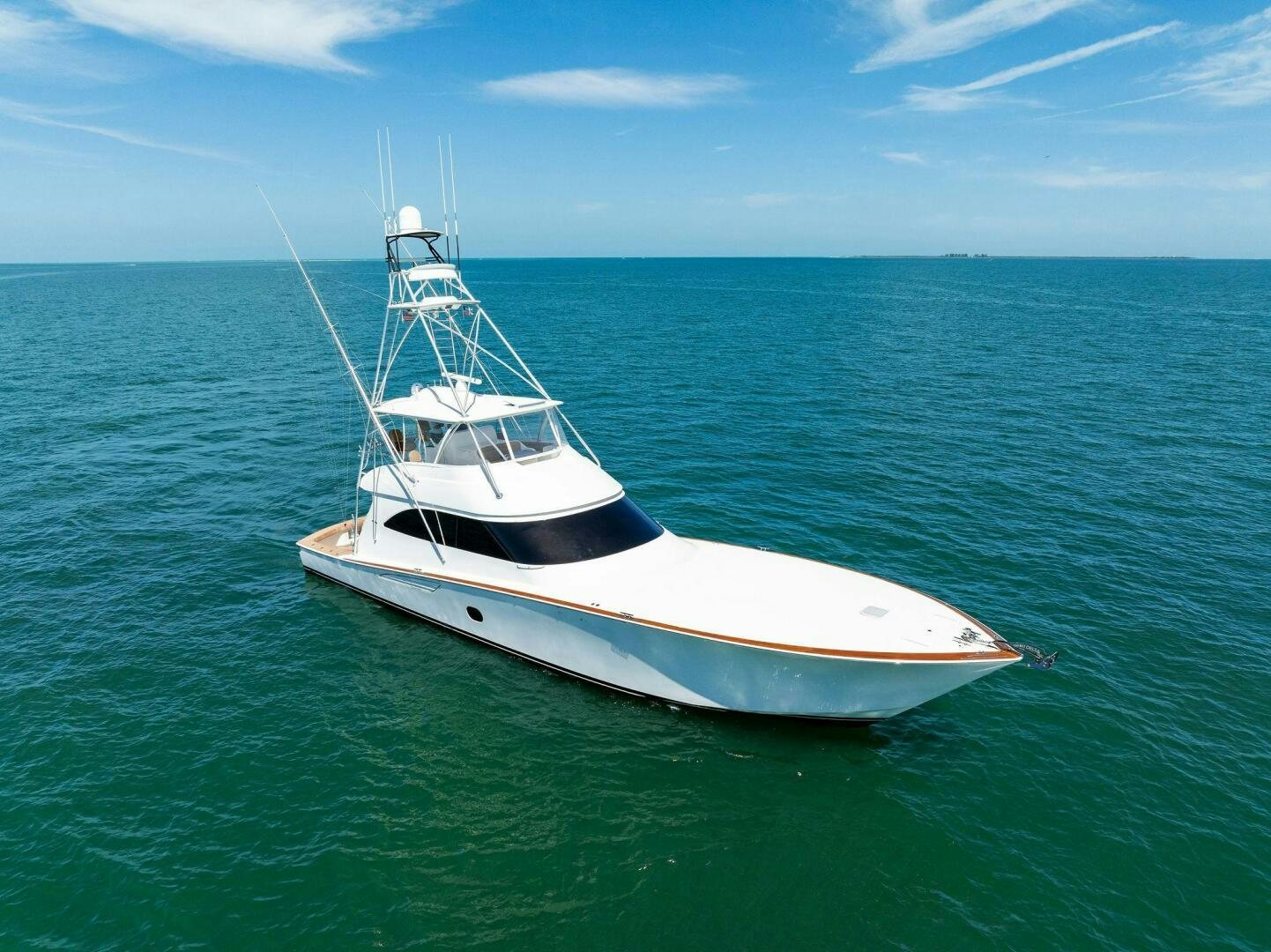 a white boat in the water aboard THE PROVIDER Yacht for Sale