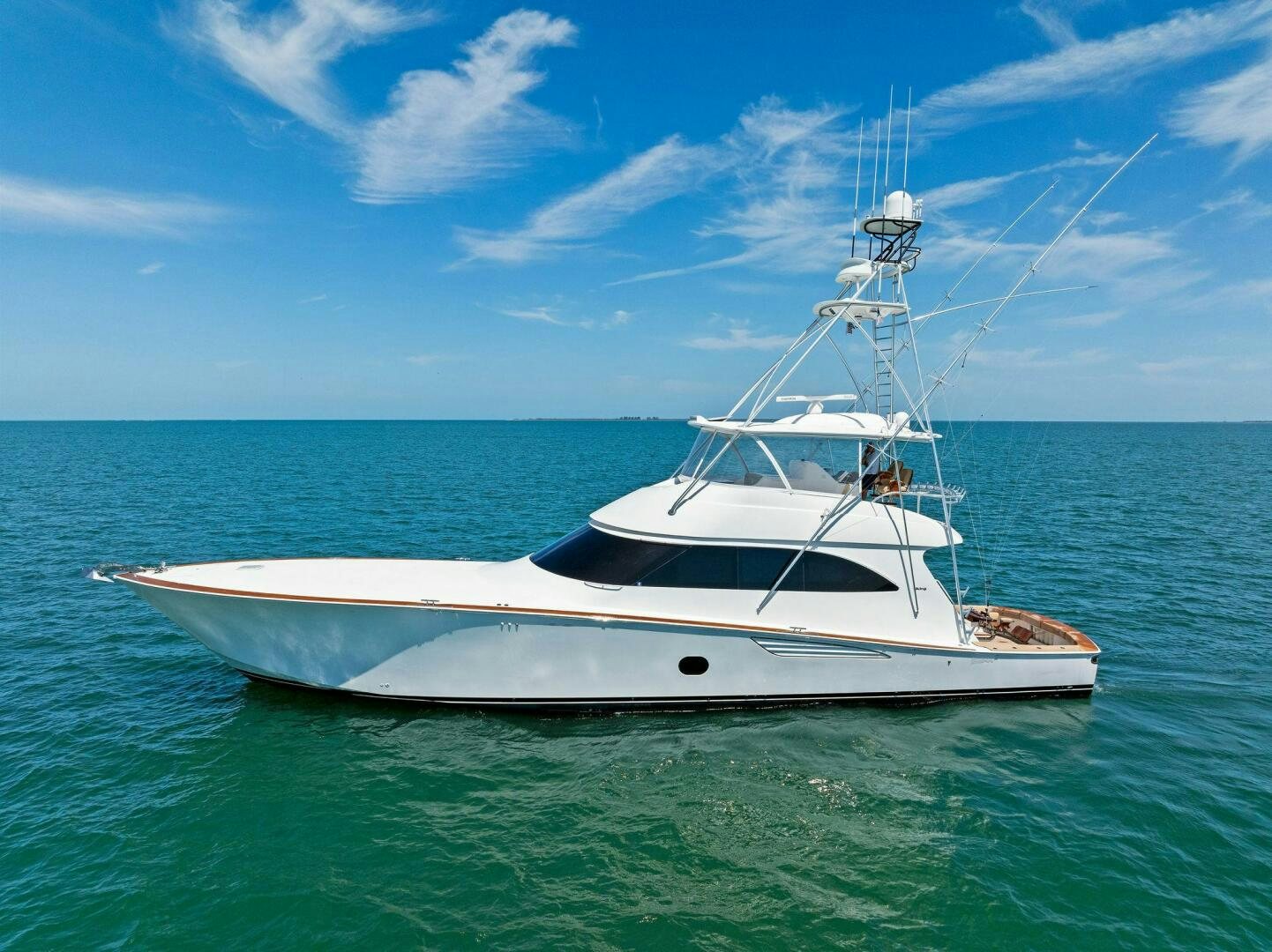 a white boat in the water aboard THE PROVIDER Yacht for Sale