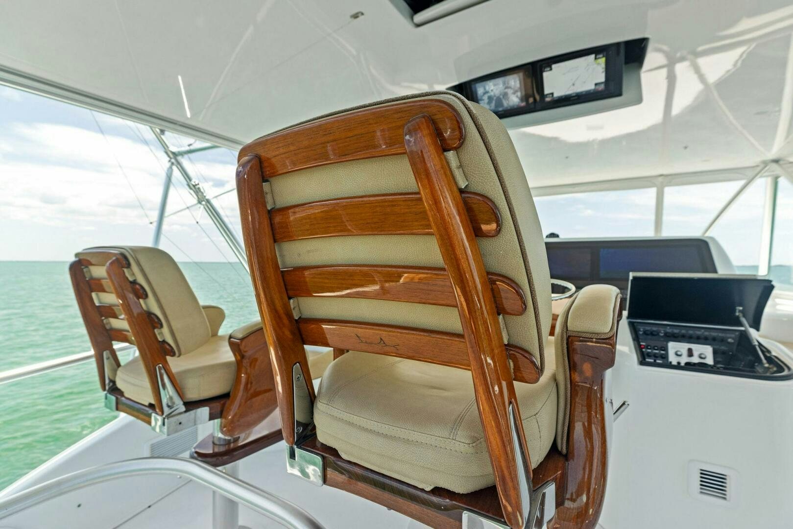 a wooden chair on a boat aboard THE PROVIDER Yacht for Sale