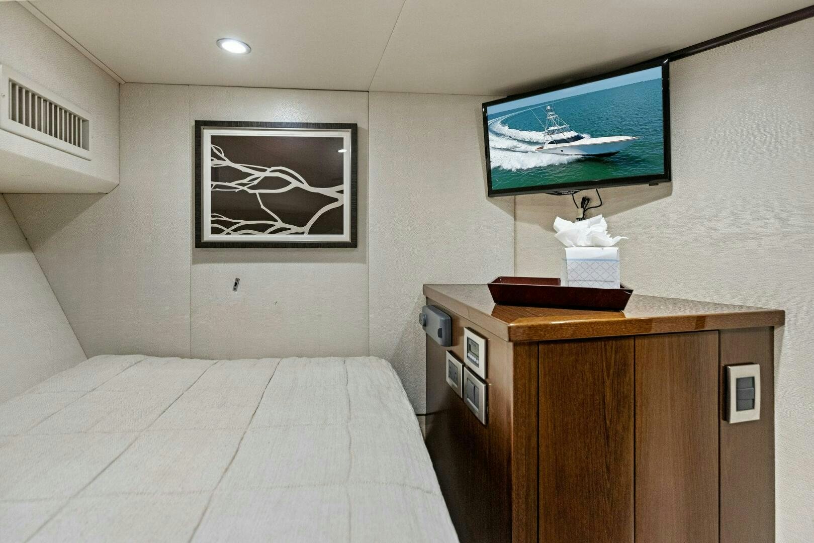 a tv on a wall aboard THE PROVIDER Yacht for Sale