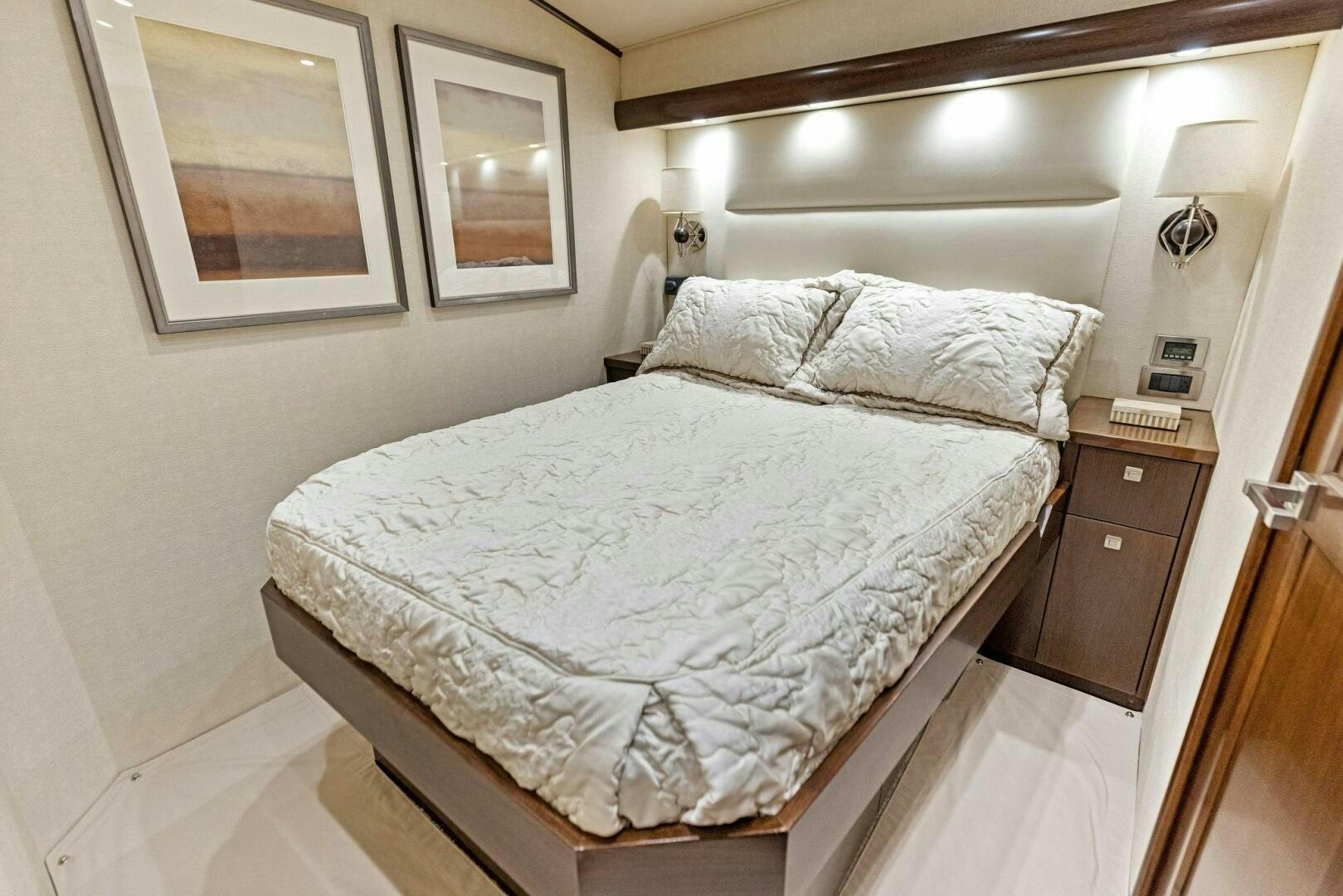 a bed with white sheets aboard THE PROVIDER Yacht for Sale