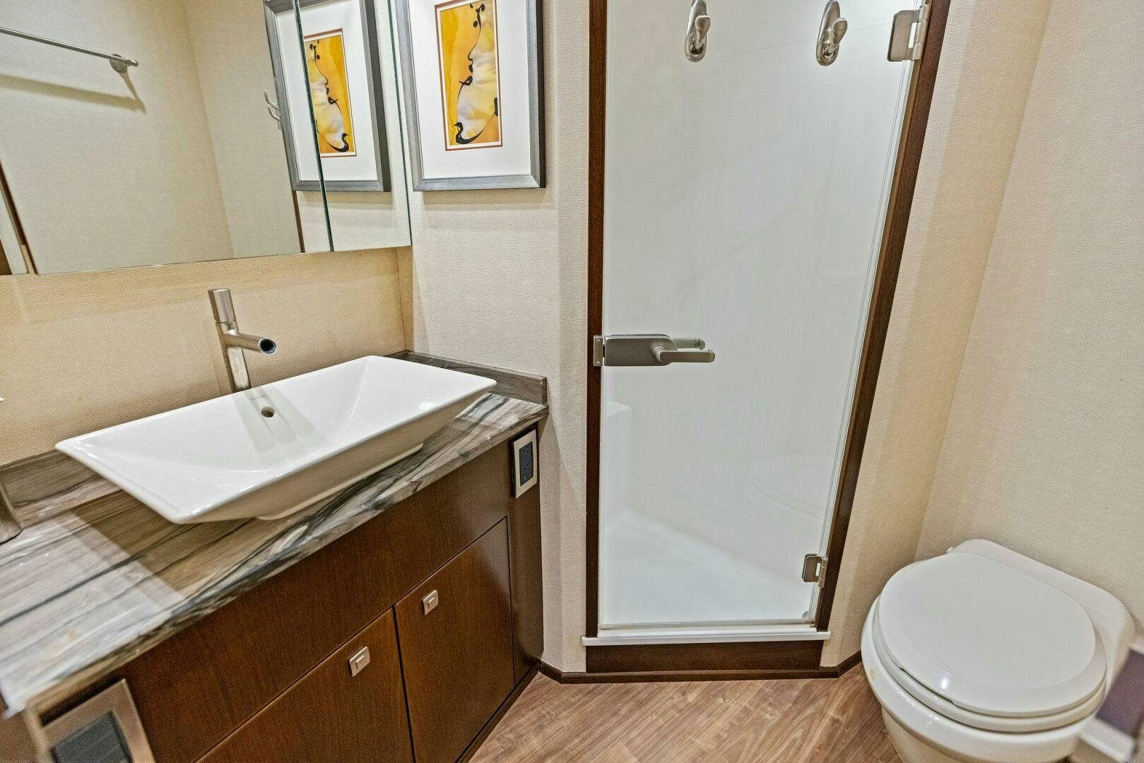 a bathroom with a sink and toilet aboard THE PROVIDER Yacht for Sale