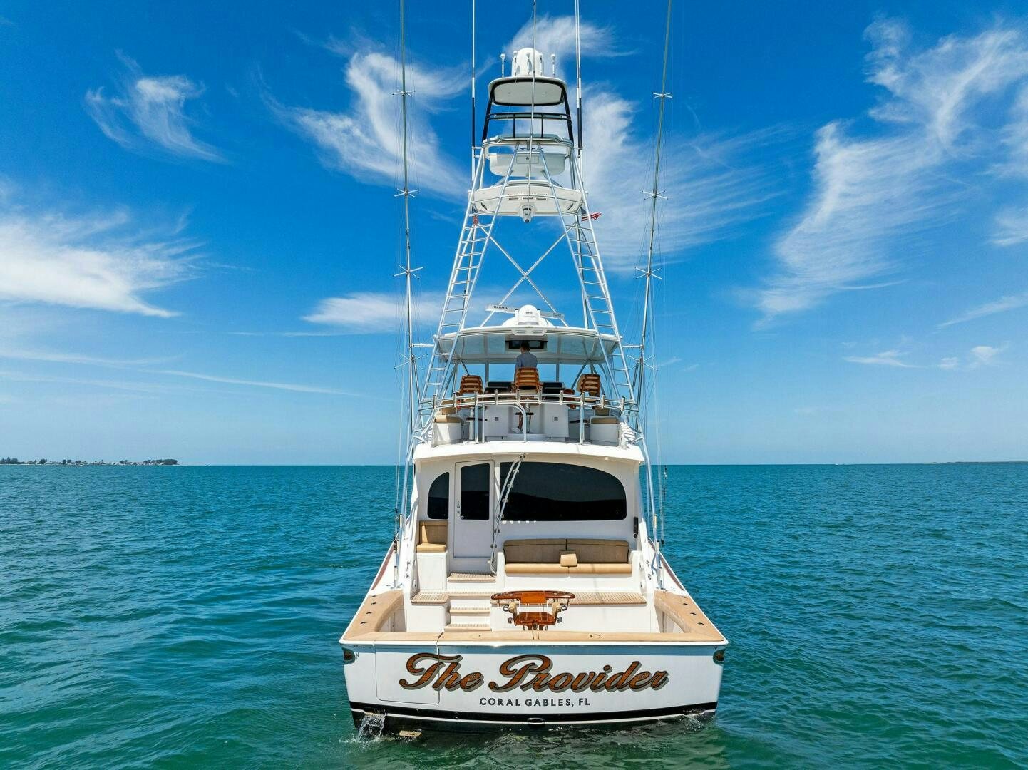 a white boat in the water aboard THE PROVIDER Yacht for Sale