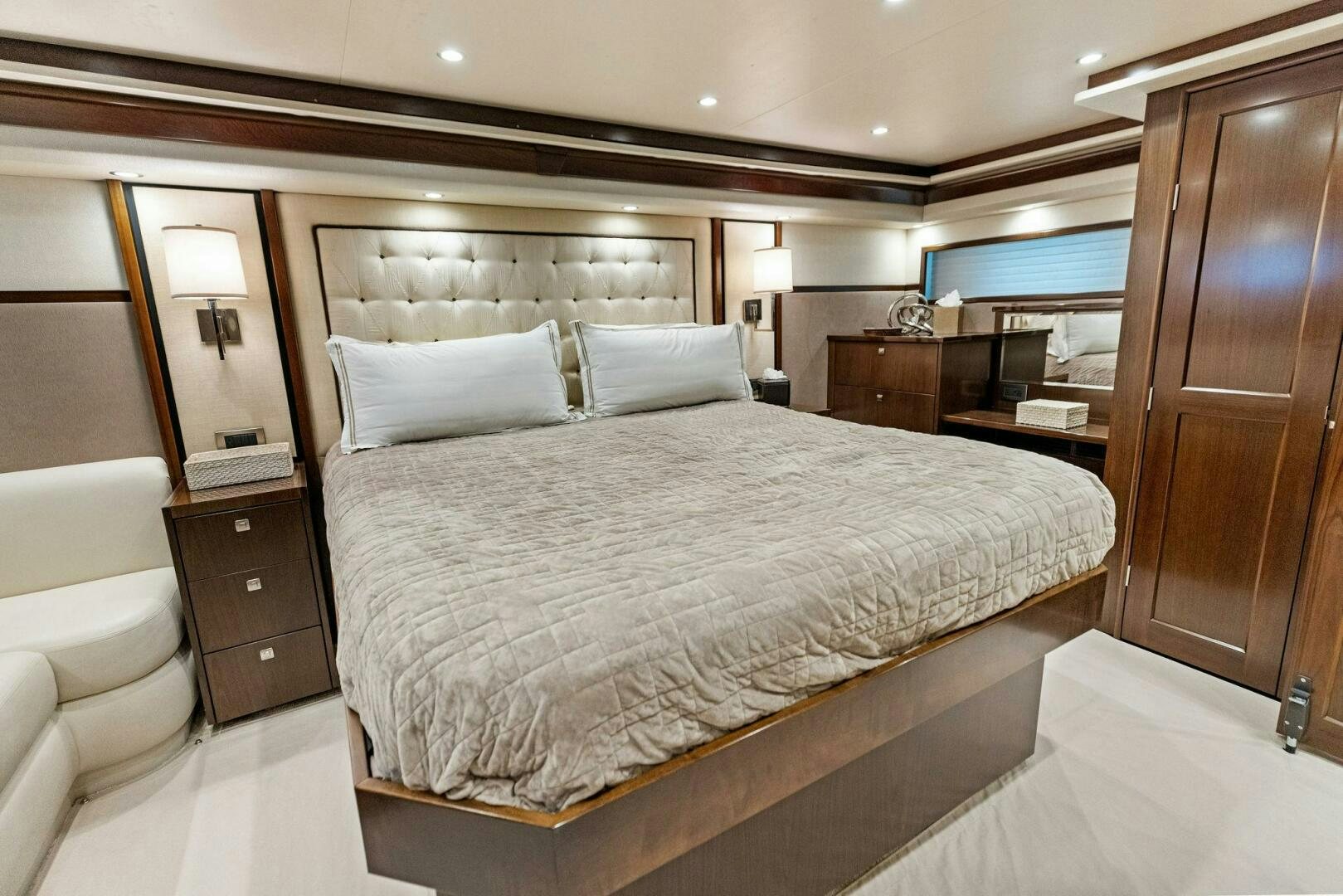 a large bed in a hotel room aboard THE PROVIDER Yacht for Sale