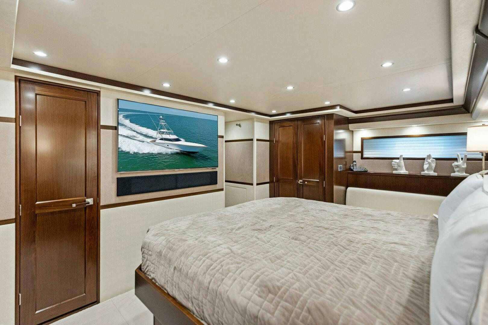 a bedroom with a large bed aboard THE PROVIDER Yacht for Sale