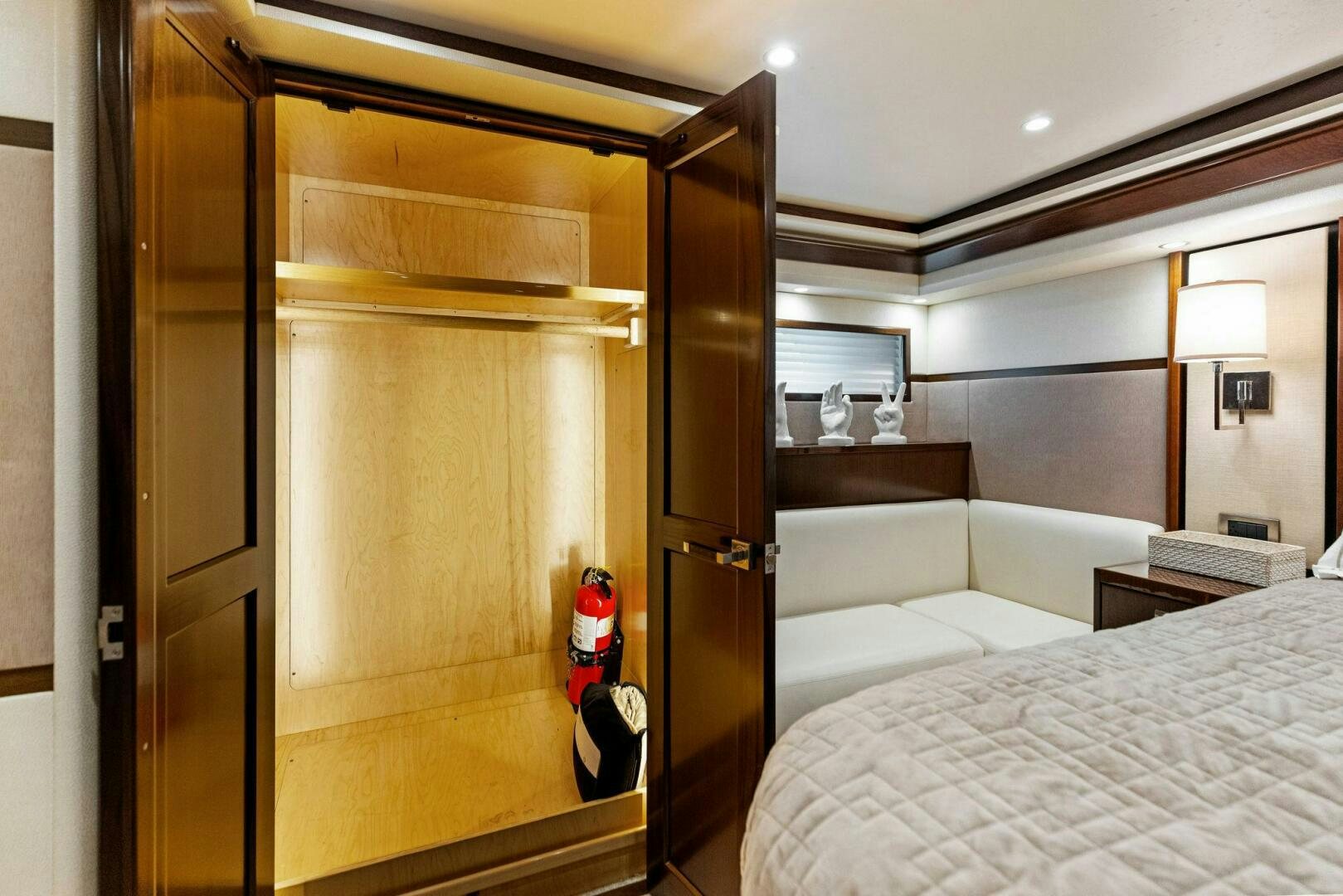a room with a bed and a closet aboard THE PROVIDER Yacht for Sale