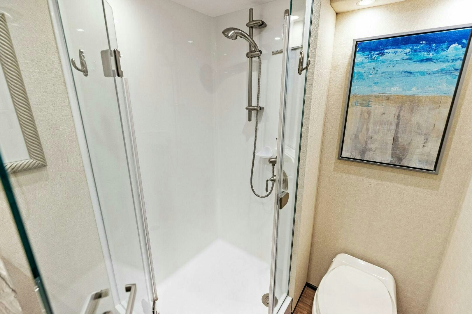 a bathroom with a shower unit aboard THE PROVIDER Yacht for Sale