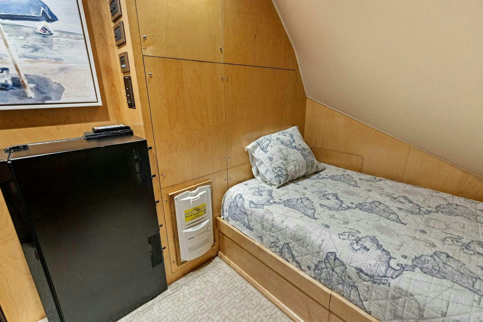 a bed with a white comforter aboard THE PROVIDER Yacht for Sale