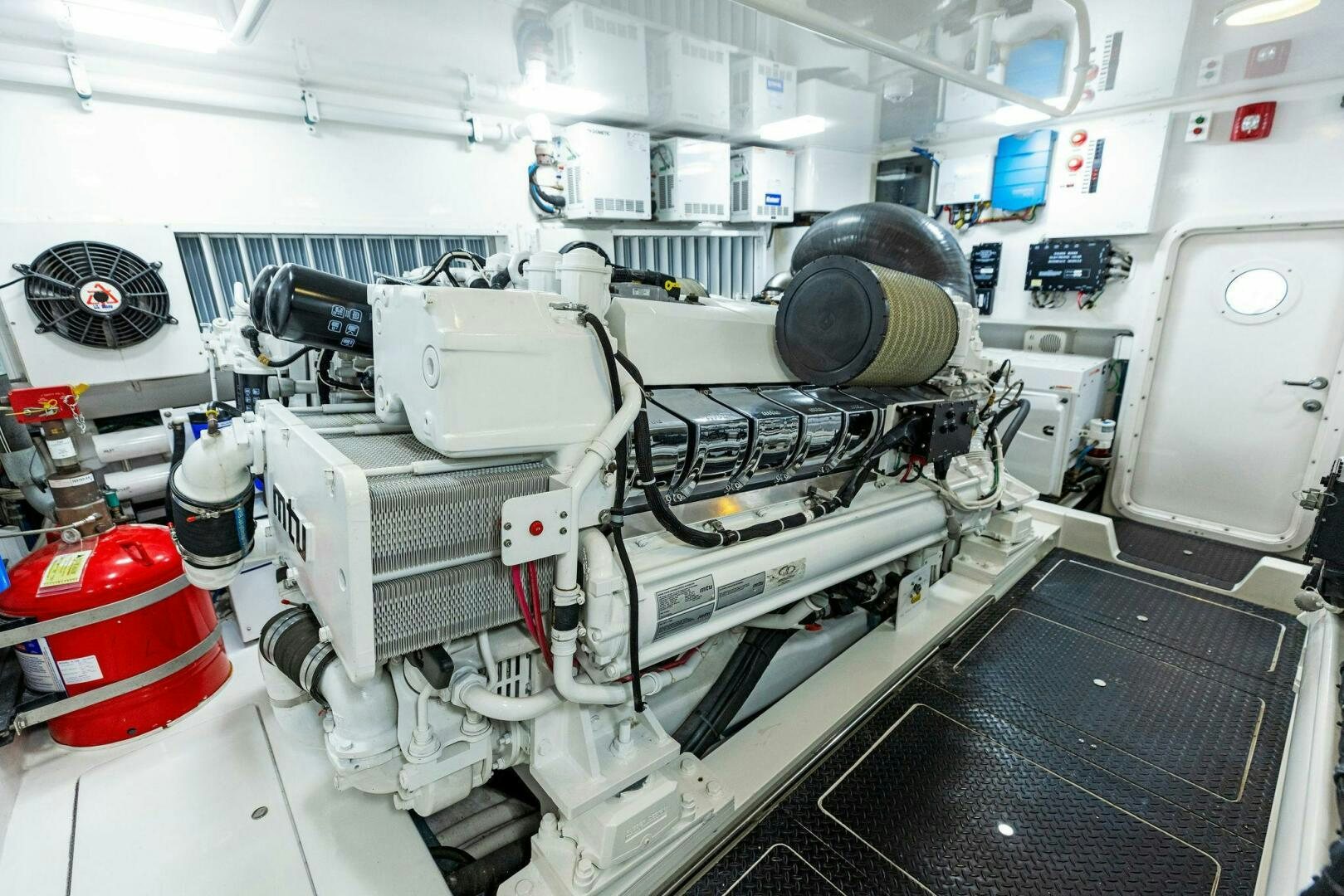 a large white machine with a black helmet on it aboard THE PROVIDER Yacht for Sale