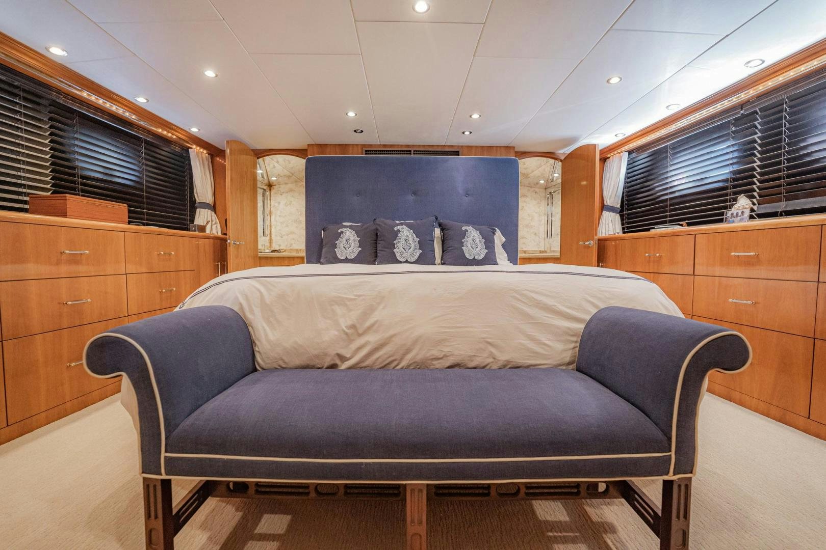 a bed in a room aboard CRISTINA Yacht for Sale