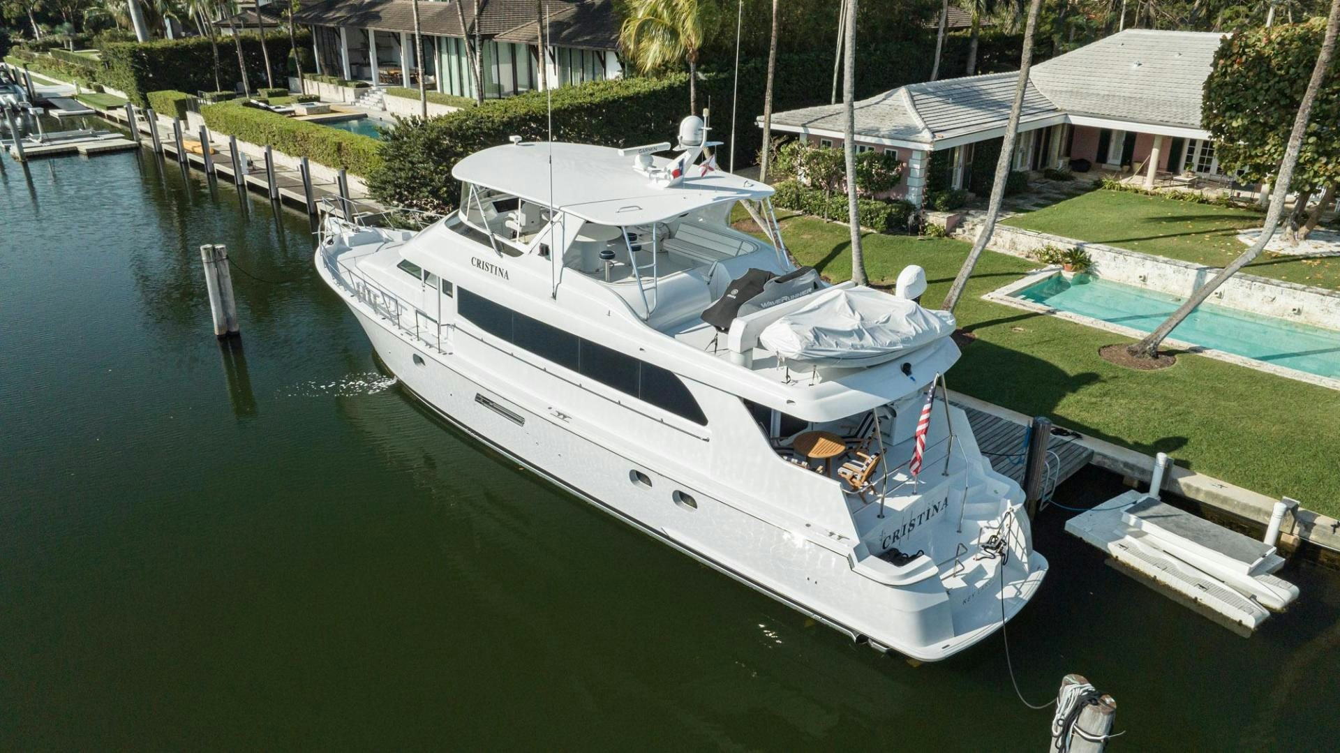 a boat docked at a pier aboard CRISTINA Yacht for Sale