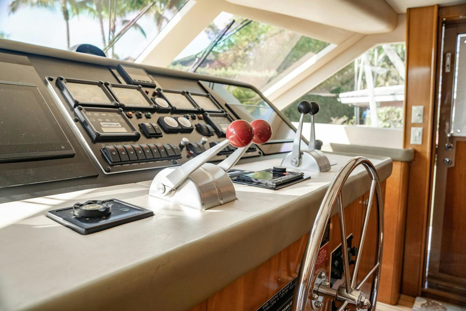 a laptop on a table aboard CRISTINA Yacht for Sale