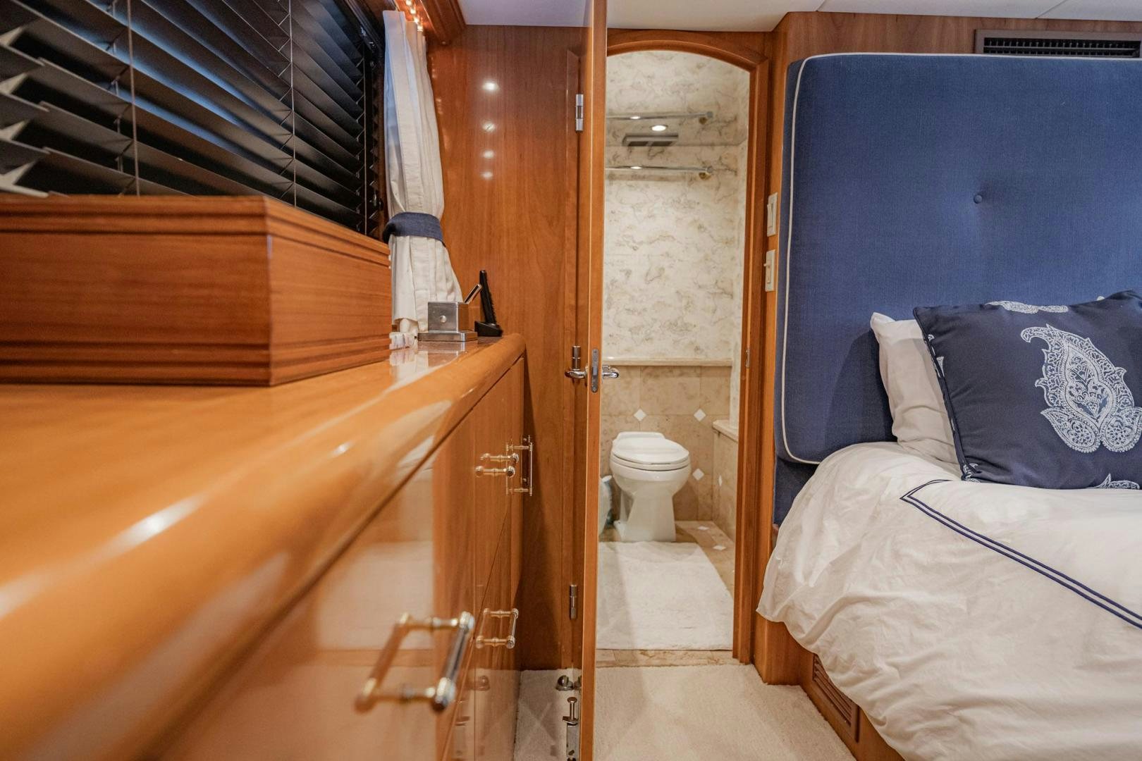 a room with a bed and a bathtub aboard CRISTINA Yacht for Sale