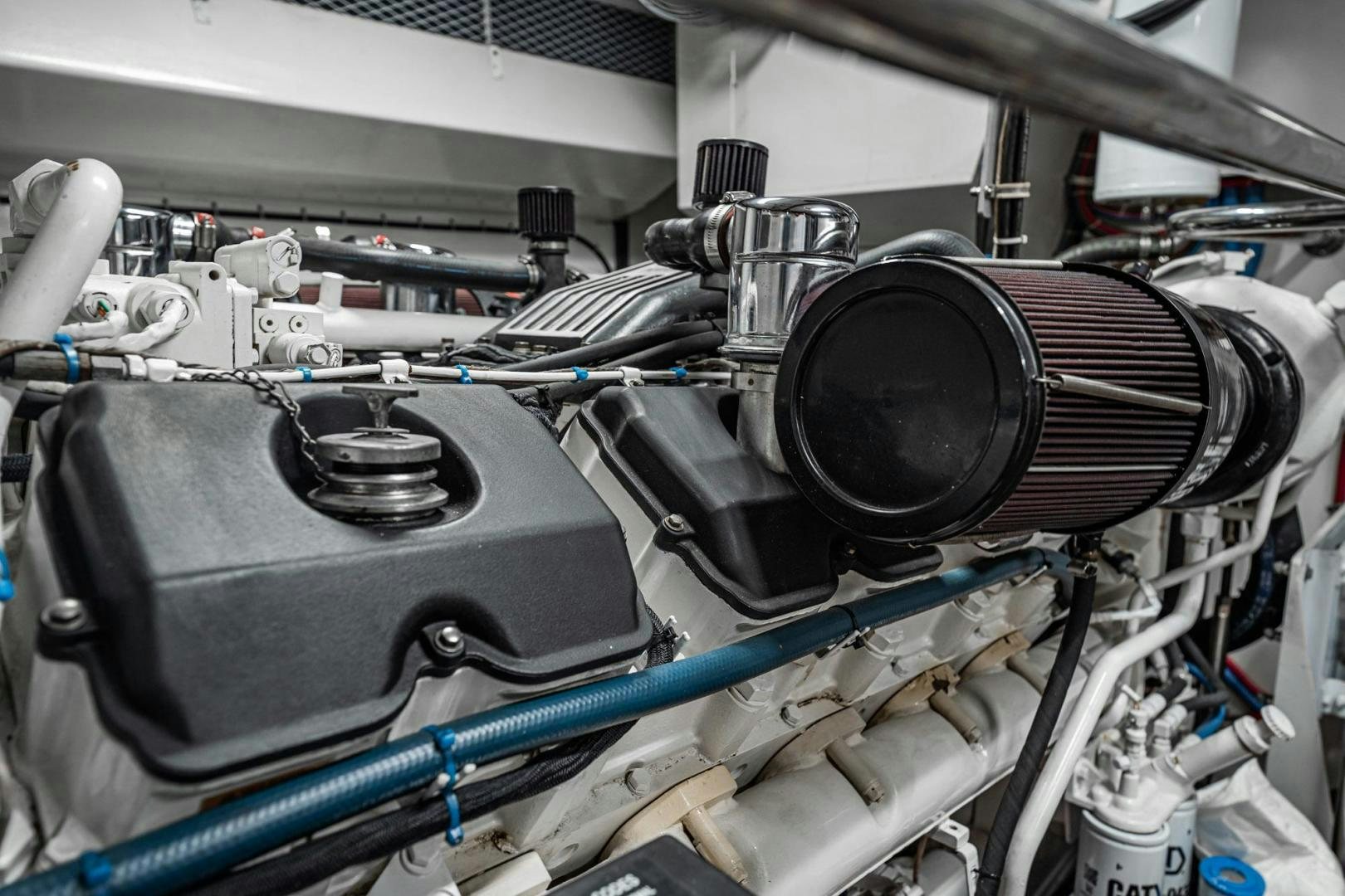 a car engine with a blue bumper aboard CRISTINA Yacht for Sale