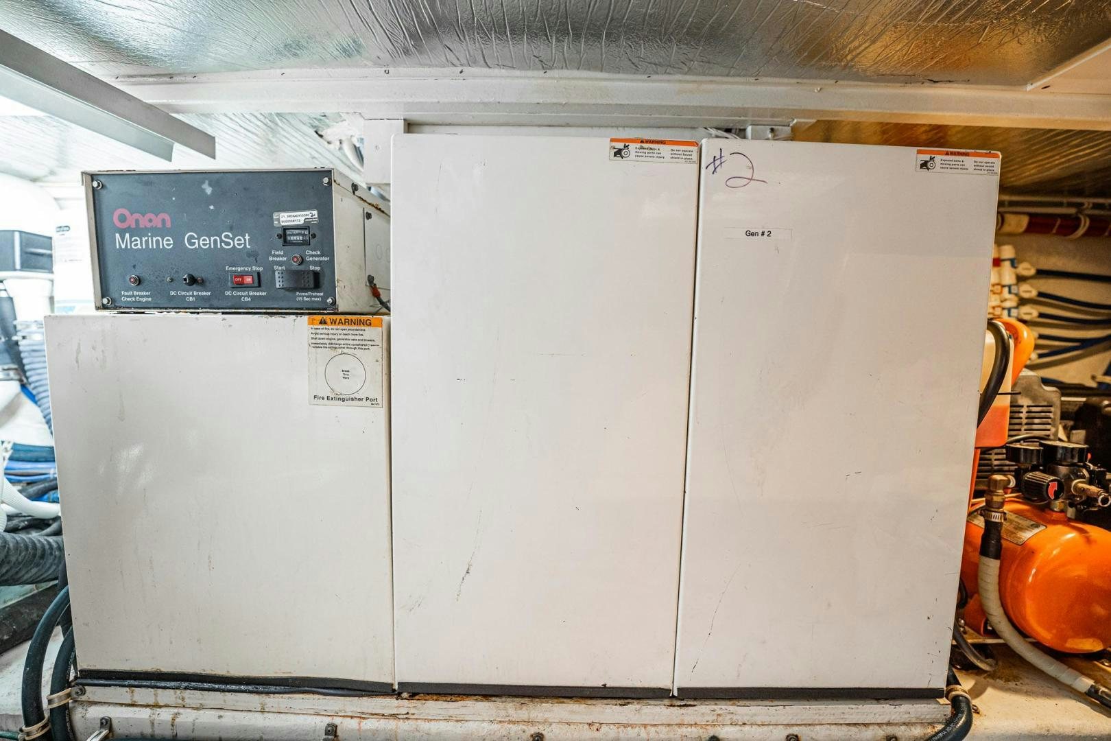 a couple of white refrigerators aboard CRISTINA Yacht for Sale