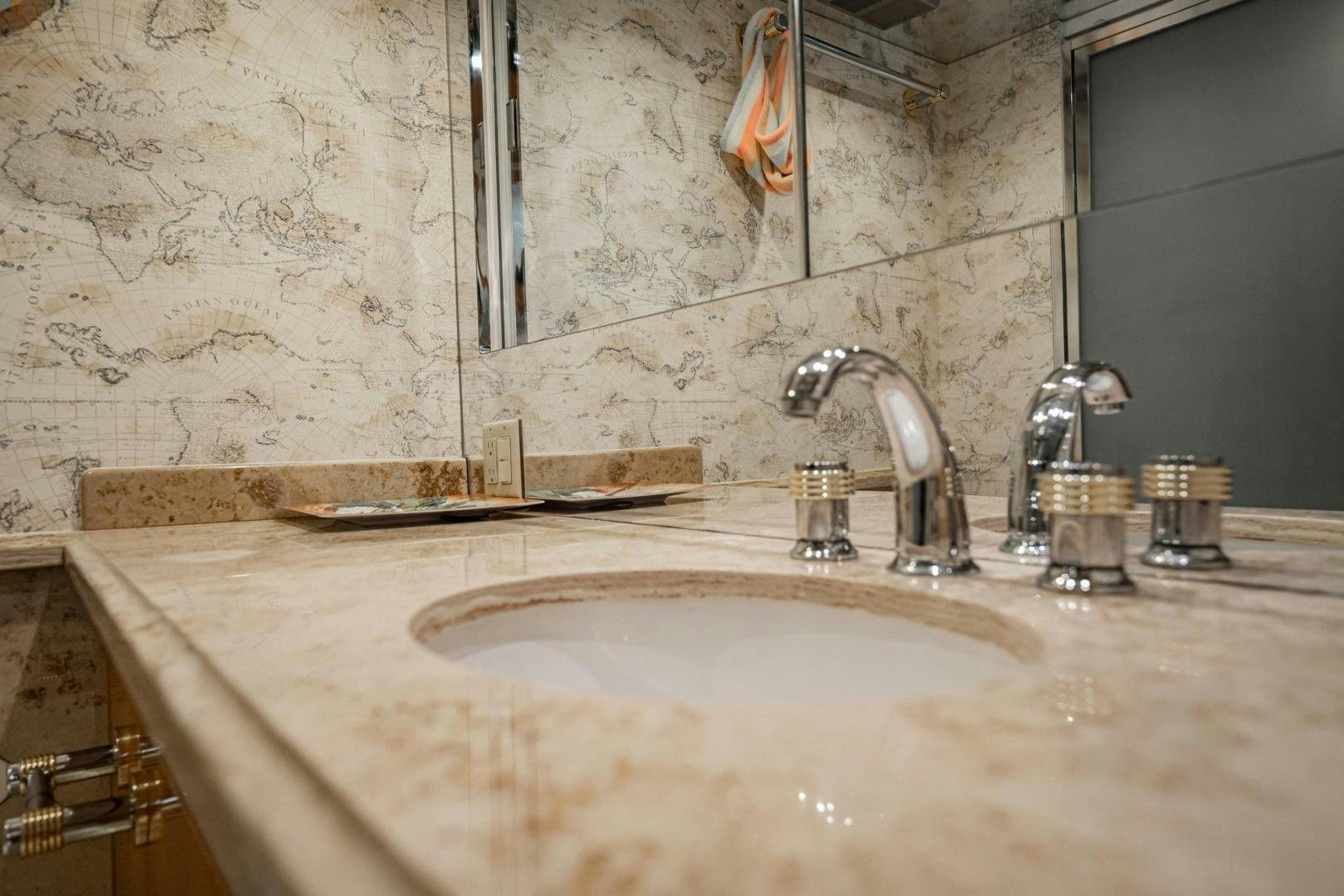 a bathroom sink with a faucet aboard CRISTINA Yacht for Sale