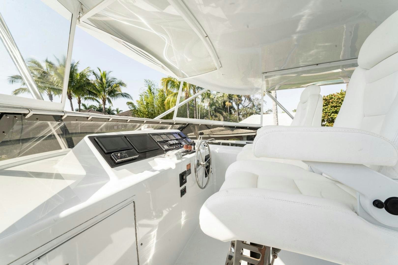 a white car with a black windshield aboard CRISTINA Yacht for Sale