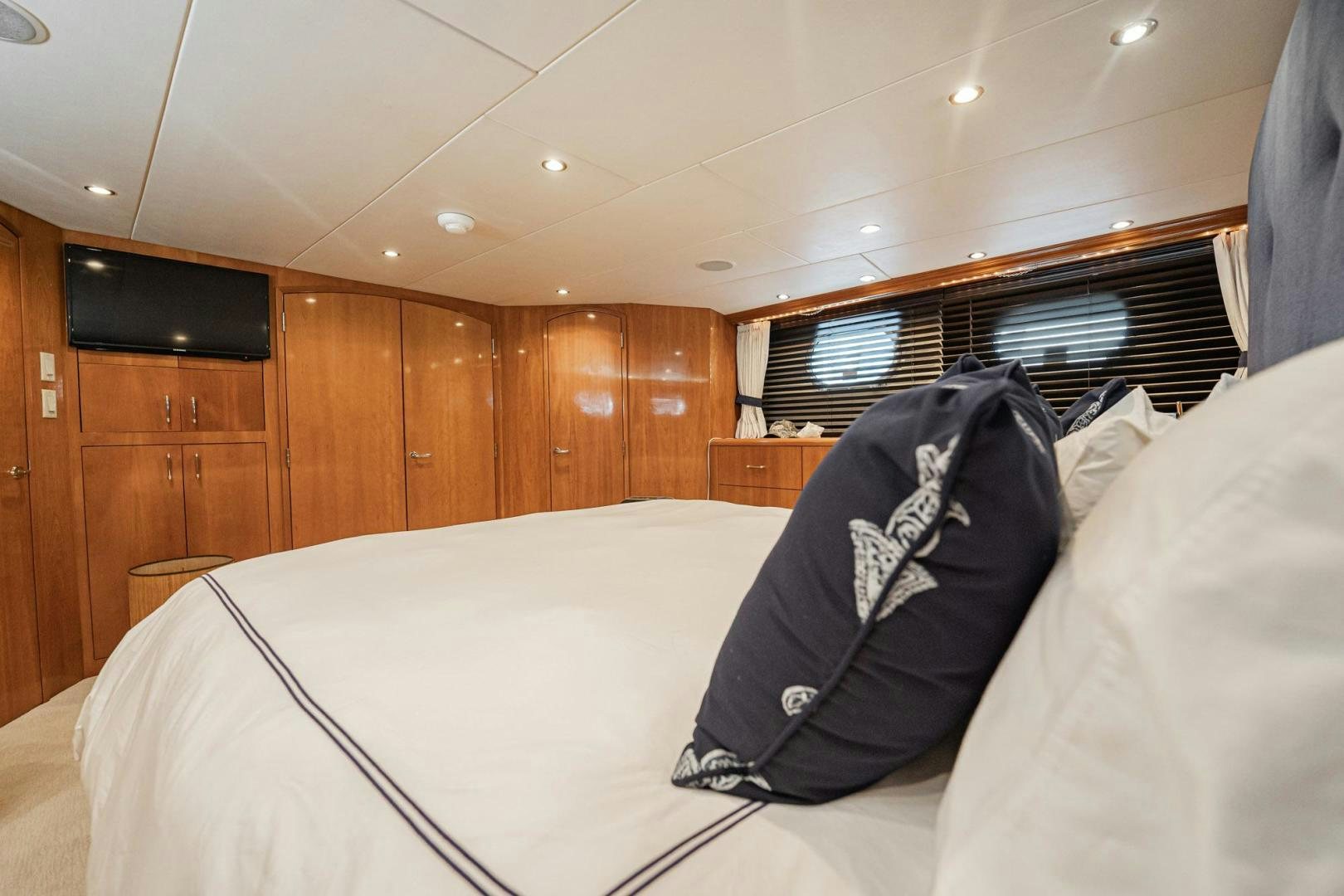 a couple of beds in a room aboard CRISTINA Yacht for Sale