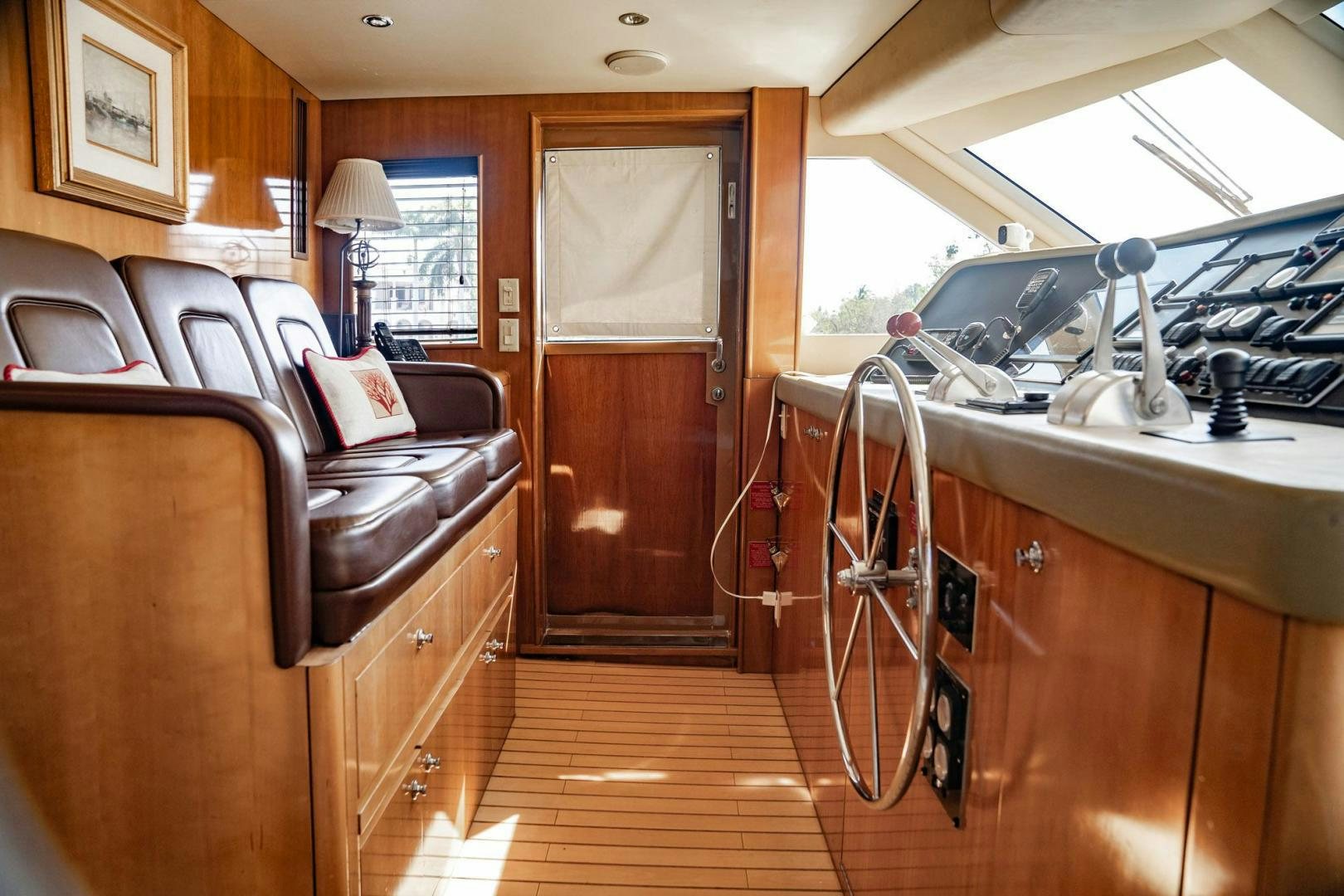 a room with a bunk bed and a desk aboard CRISTINA Yacht for Sale