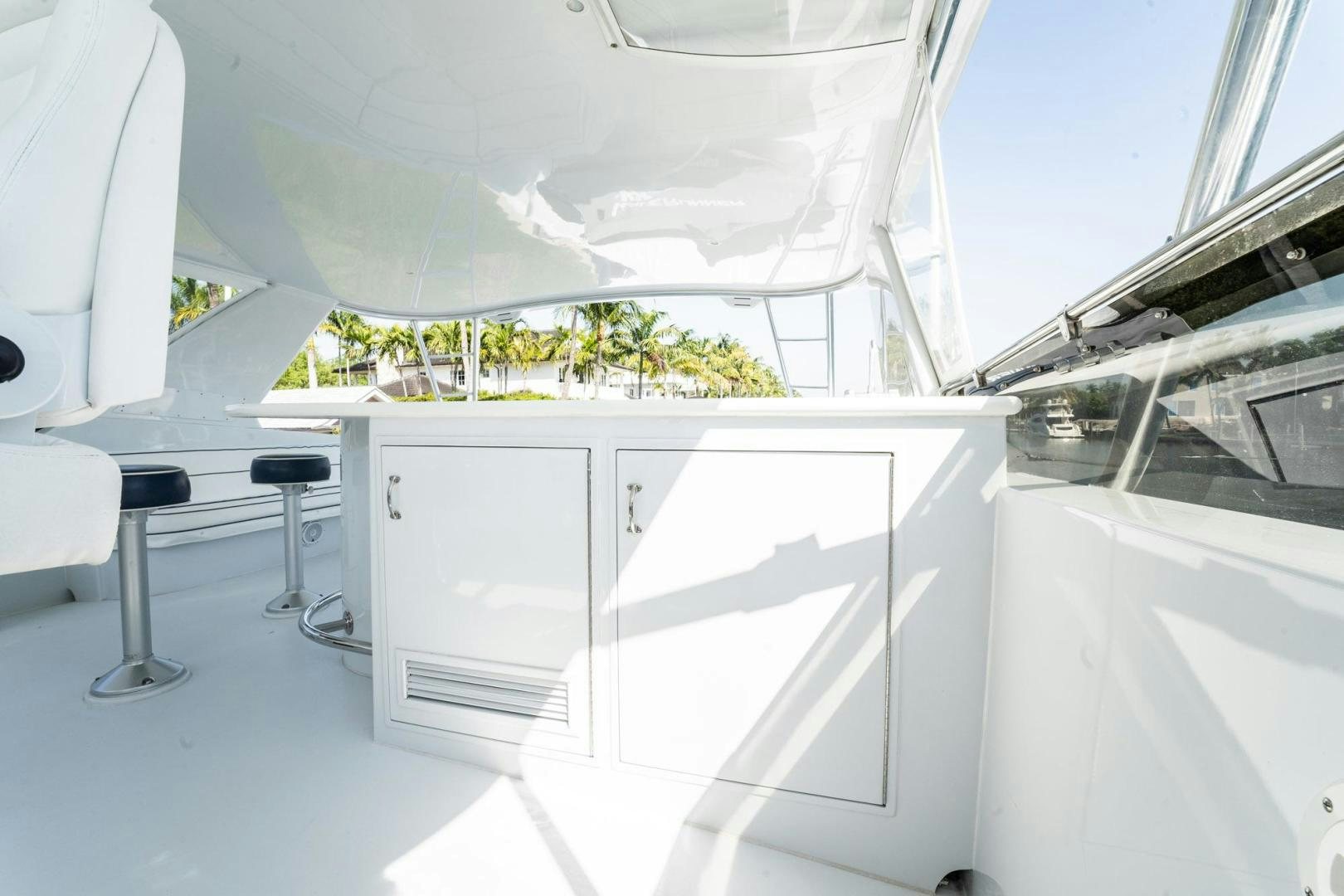 a white boat with a white roof aboard CRISTINA Yacht for Sale