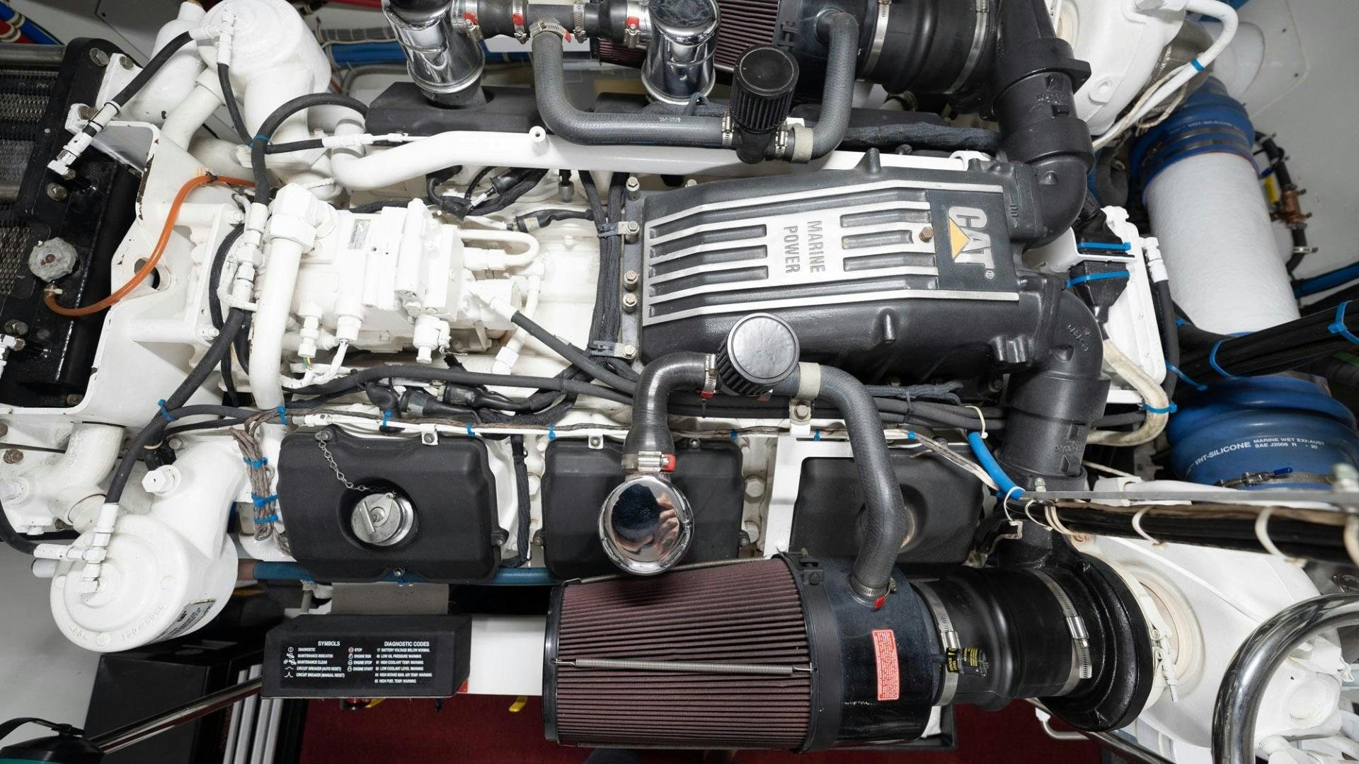 a car engine with wires aboard CRISTINA Yacht for Sale