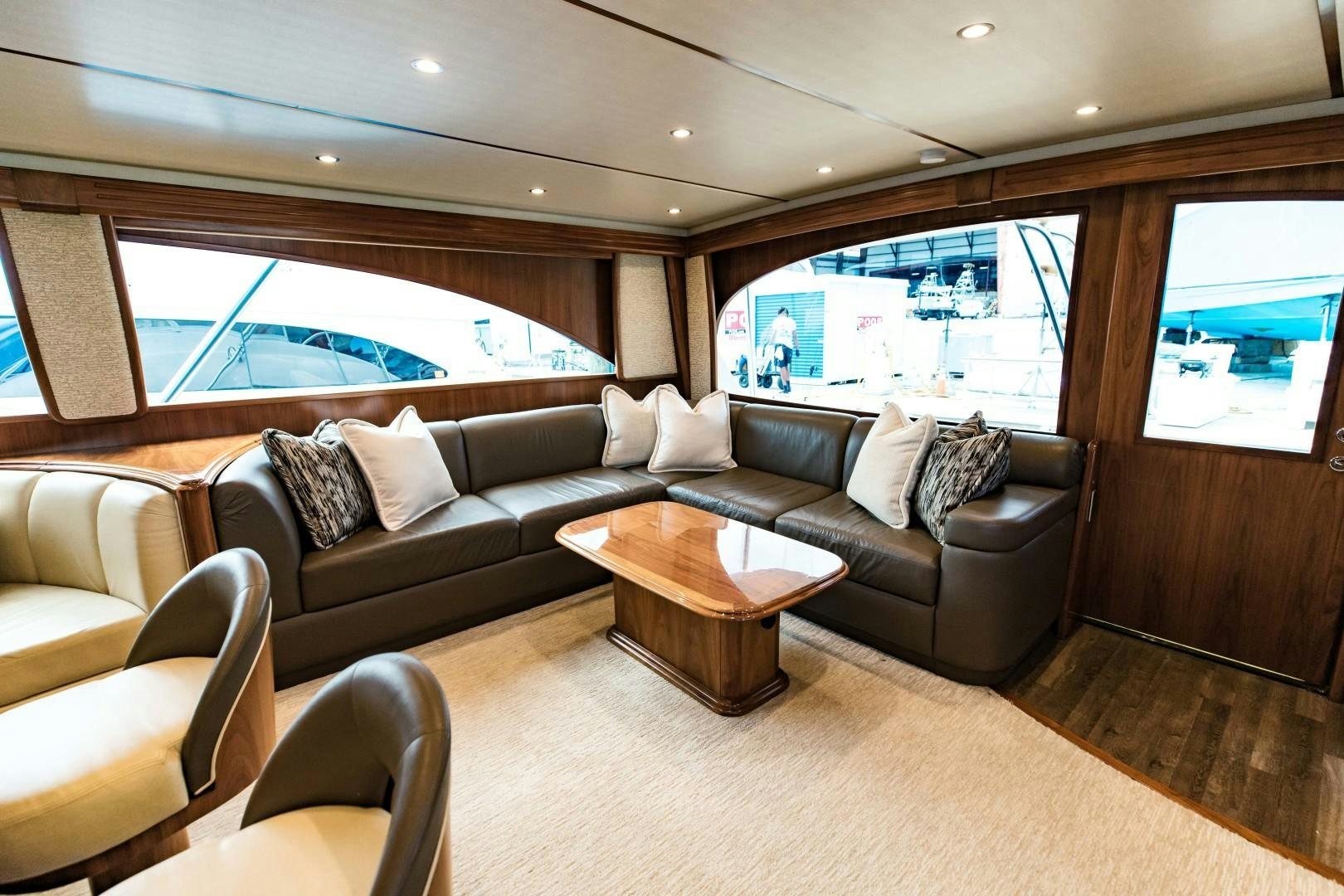 a living room with a couch and a table aboard SHOE Yacht for Sale