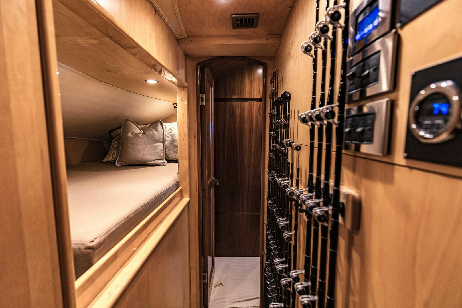 a room with a bed and a ladder aboard SHOE Yacht for Sale