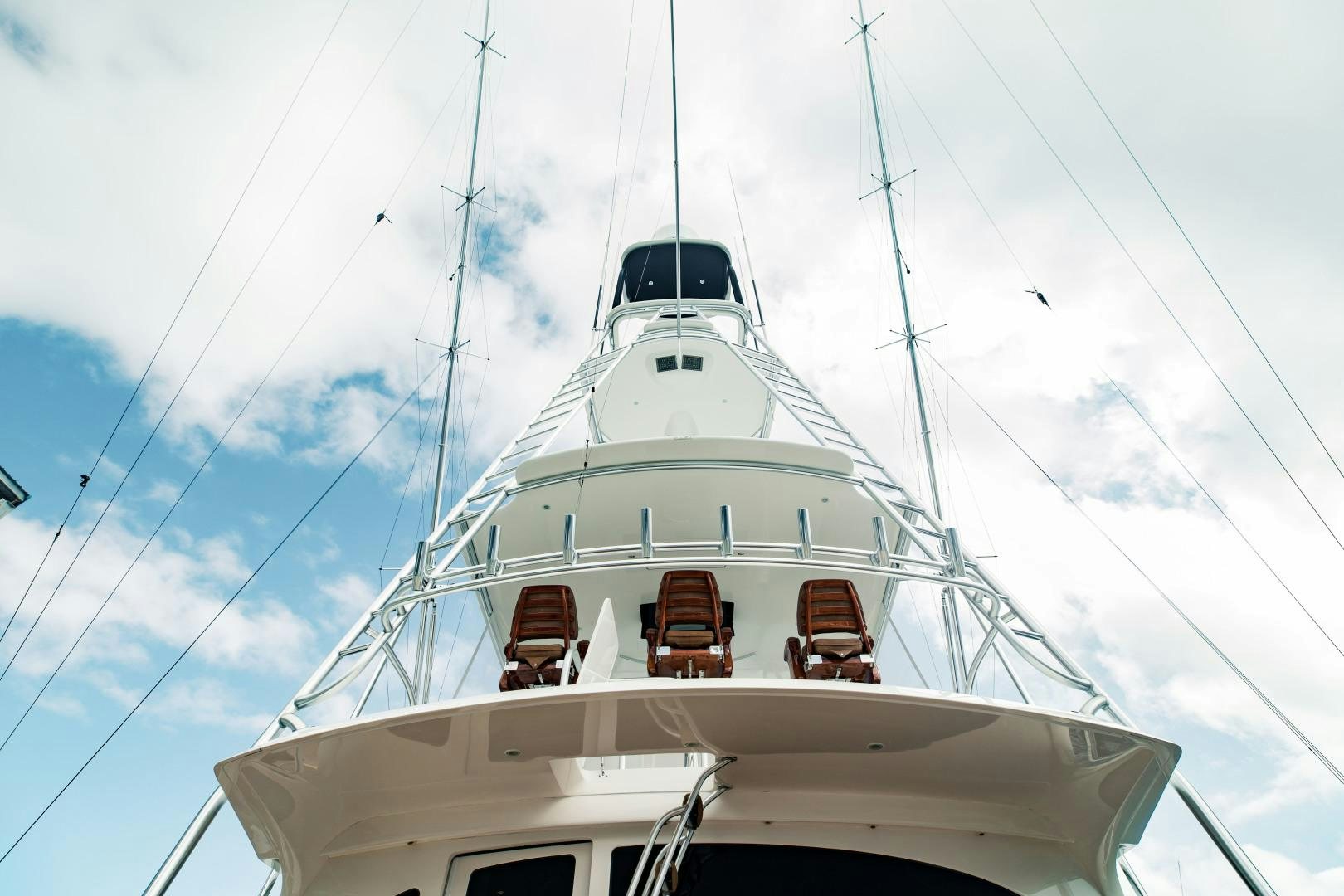 a white boat with a group of seats on it aboard SHOE Yacht for Sale
