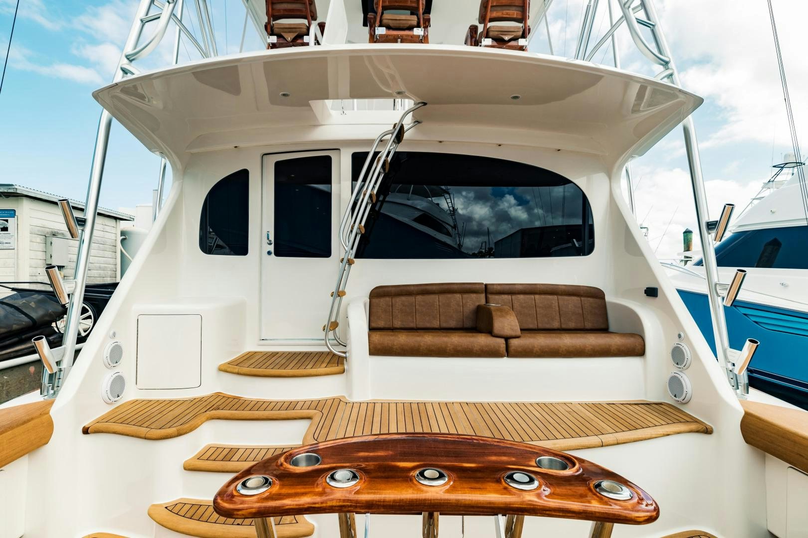 a boat with a seat aboard SHOE Yacht for Sale