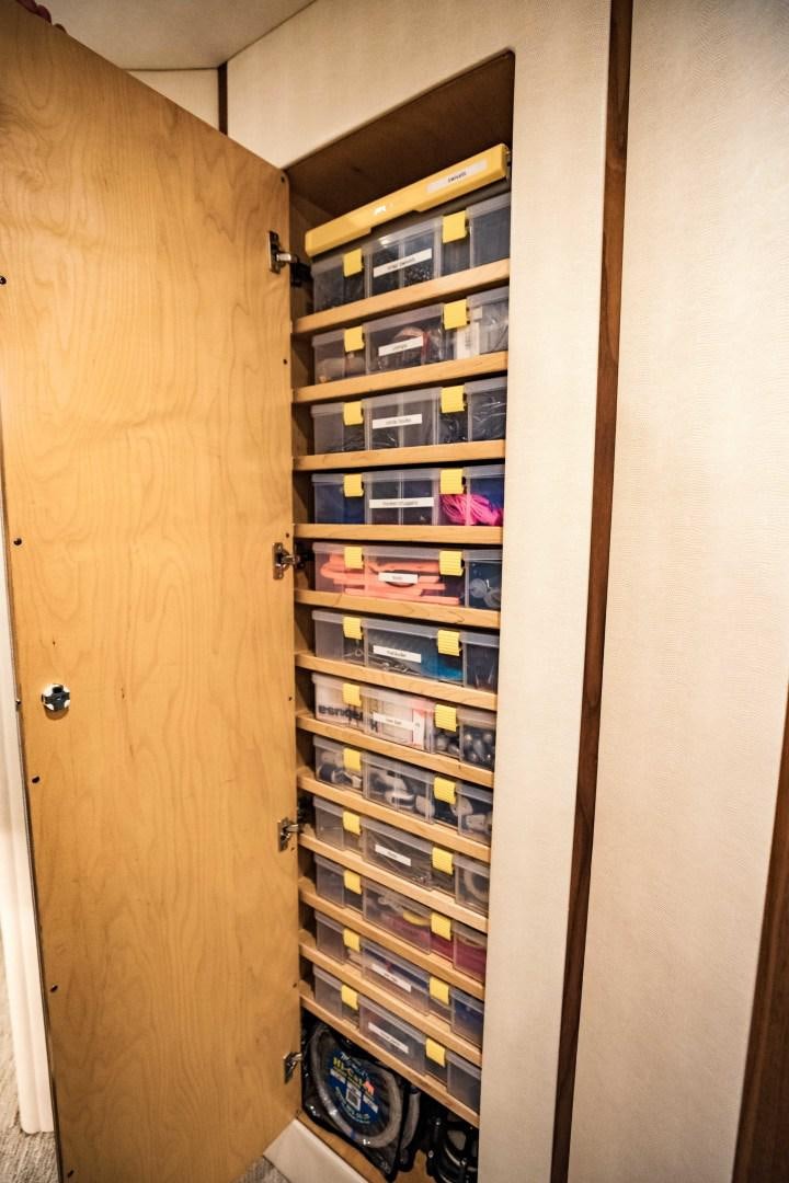 a closet with shelves aboard SHOE Yacht for Sale