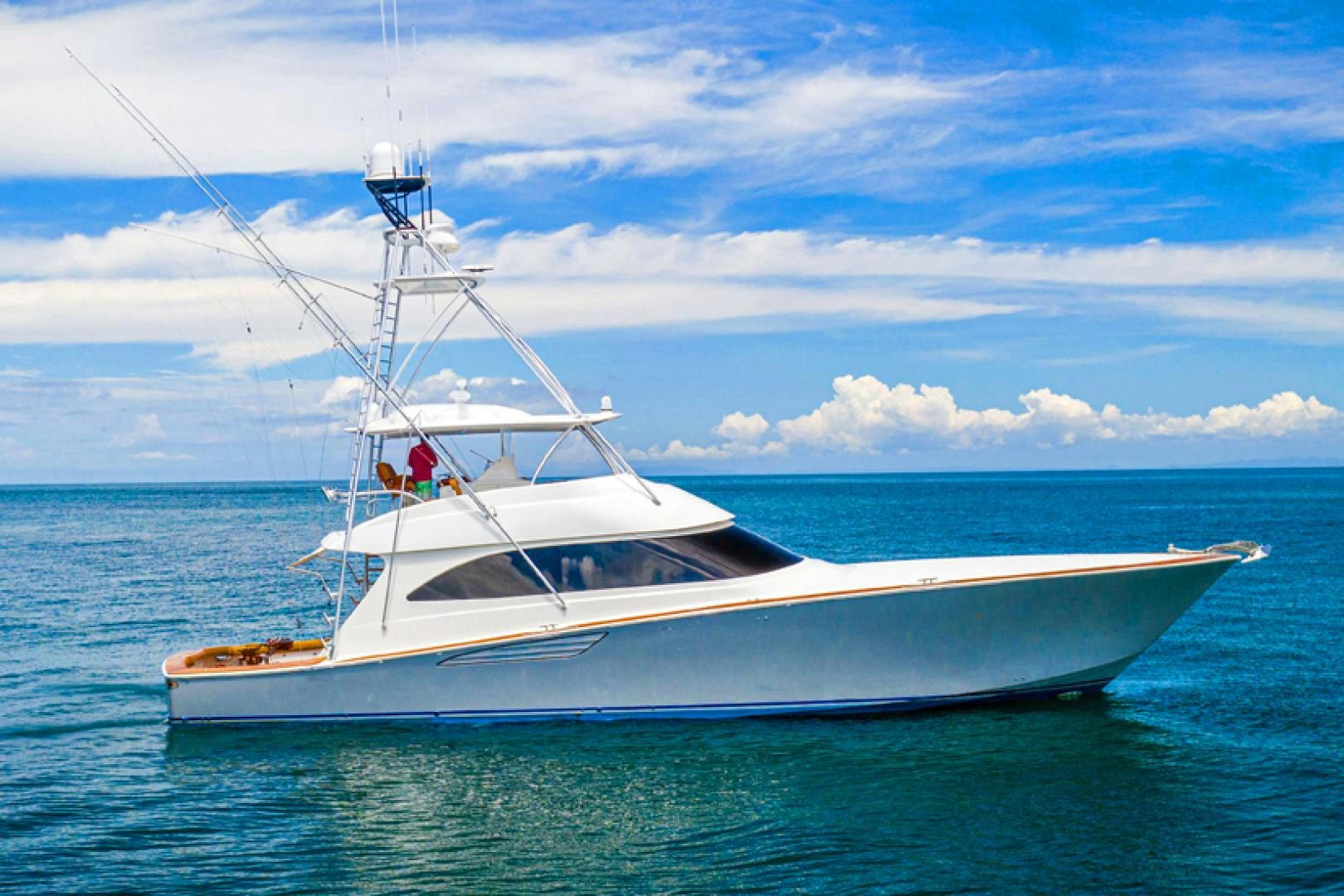 a white boat in the water aboard SHOE Yacht for Sale