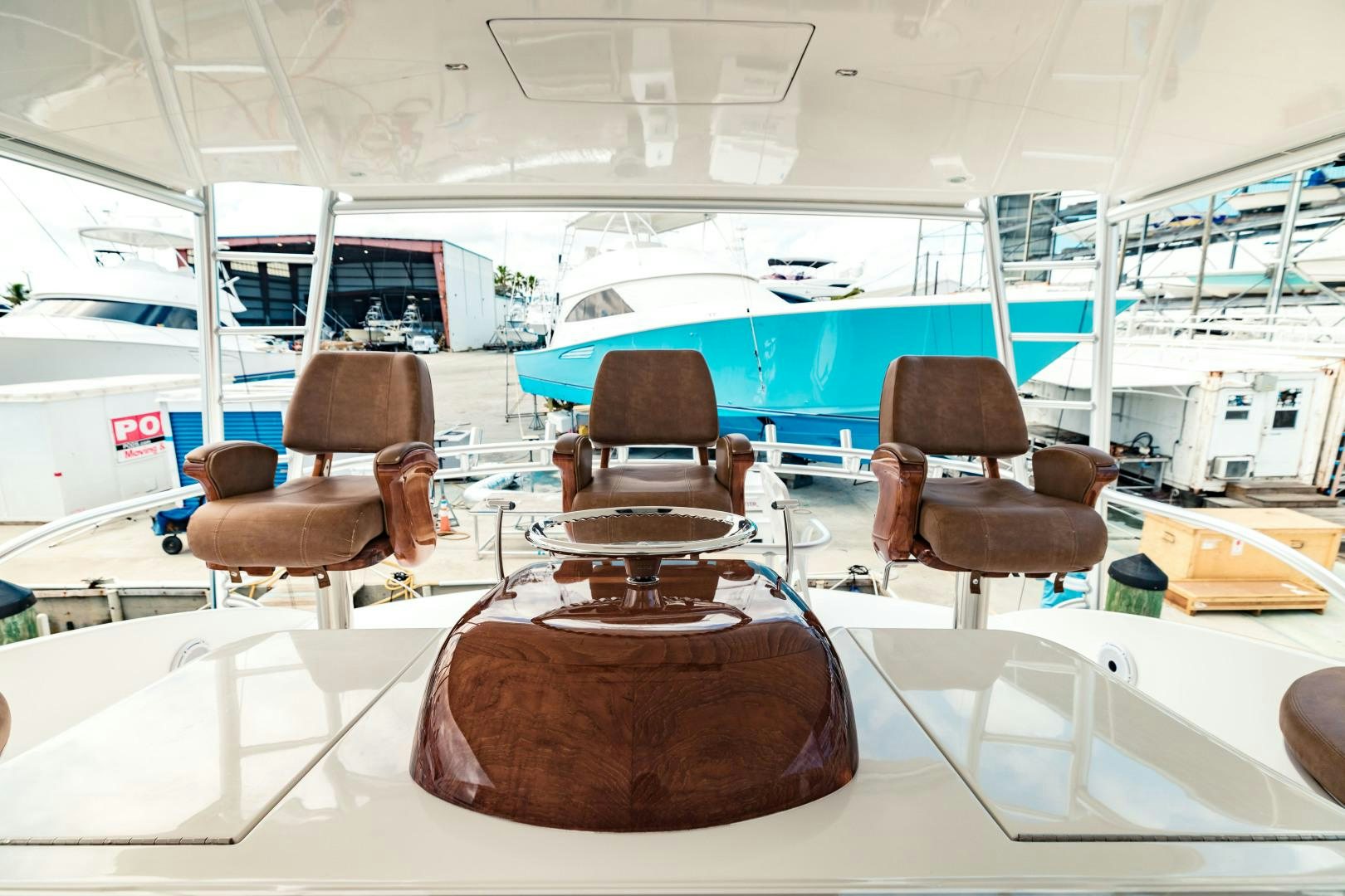 a group of chairs in a room aboard SHOE Yacht for Sale