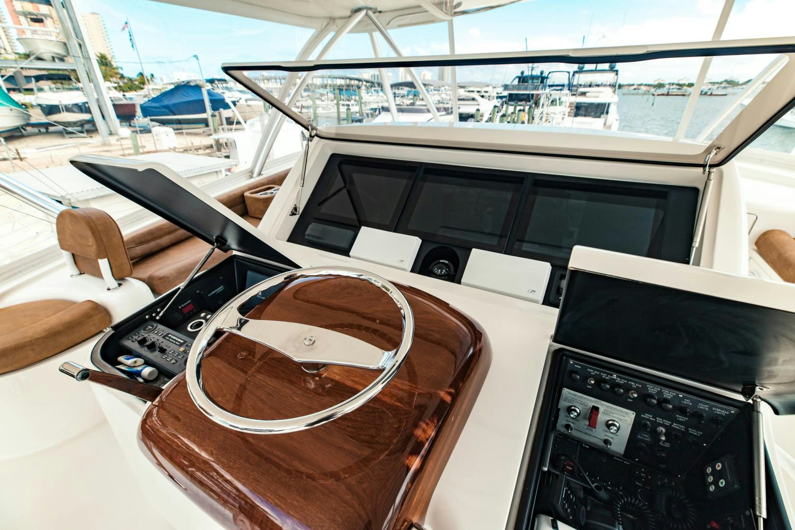 a table with a couple of electronic devices on it aboard SHOE Yacht for Sale