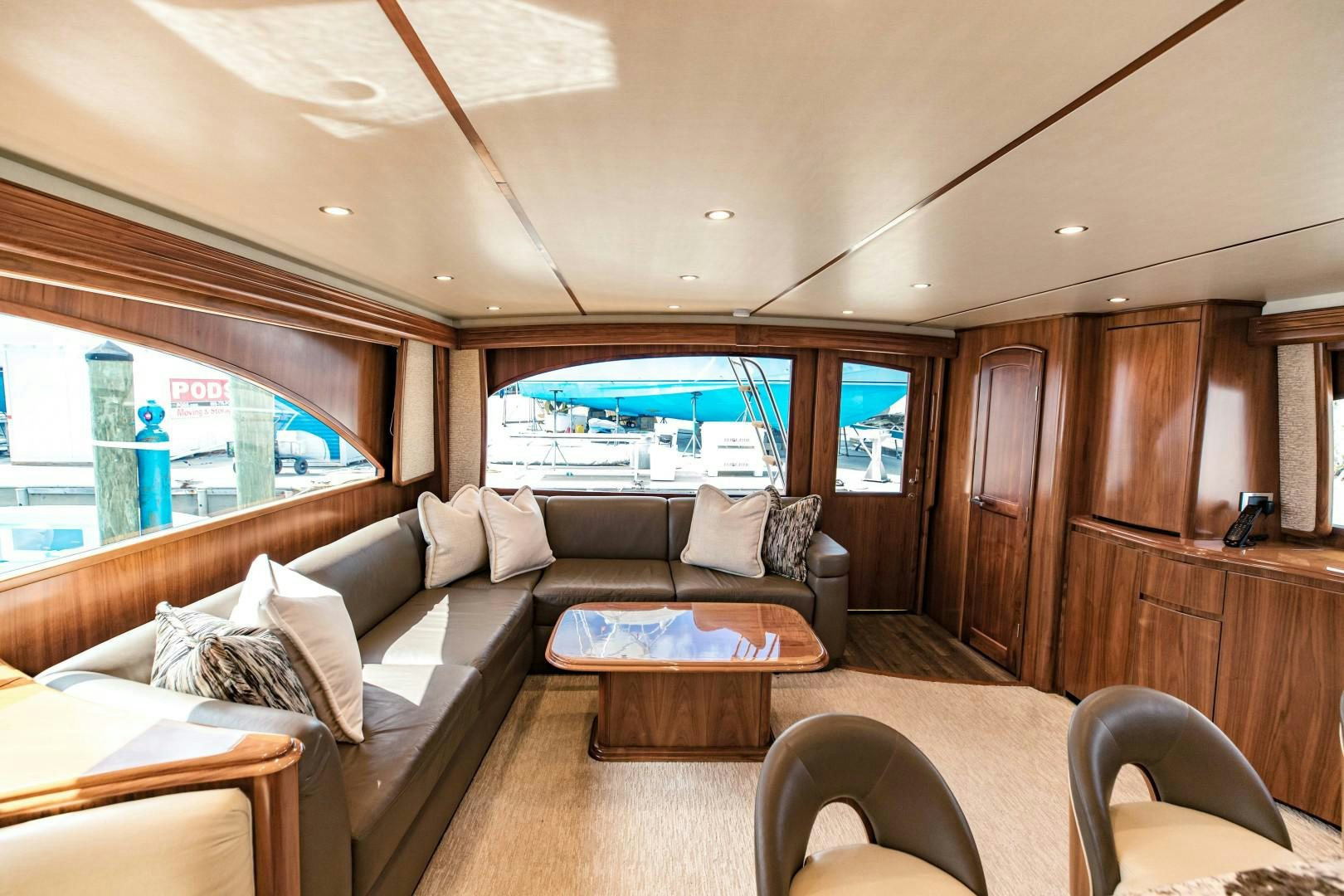 a living room with a large window aboard SHOE Yacht for Sale