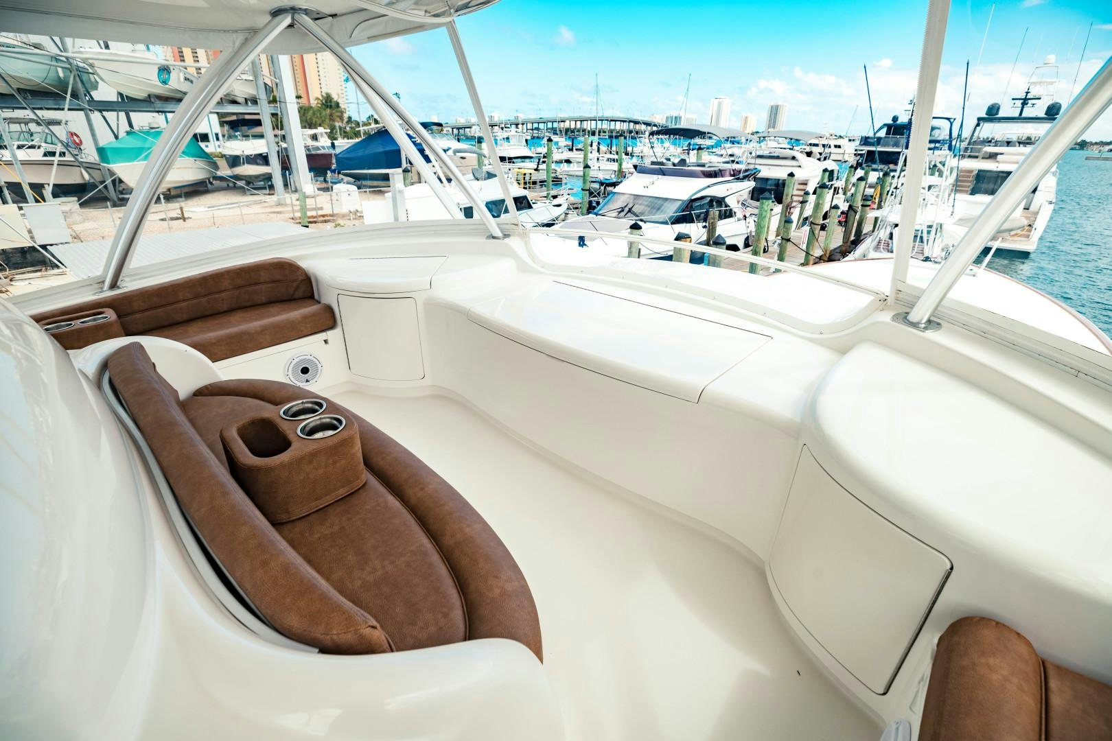 a close-up of a steering wheel on a boat aboard SHOE Yacht for Sale