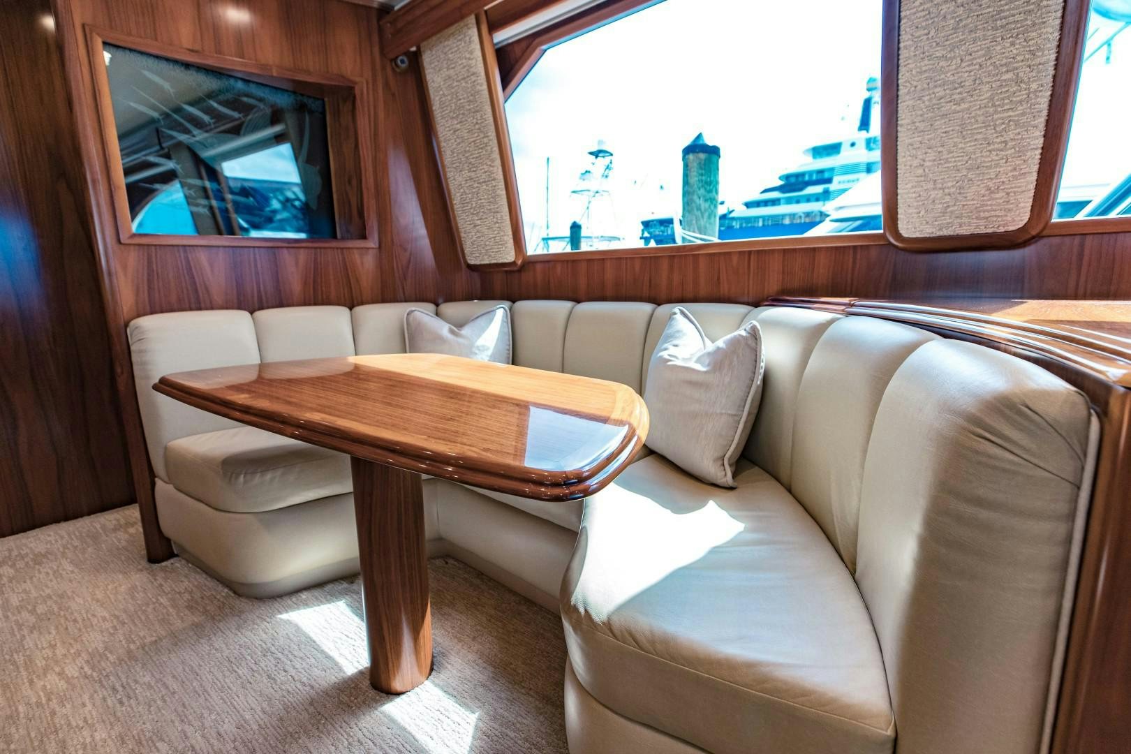 a room with a couch and a table aboard SHOE Yacht for Sale