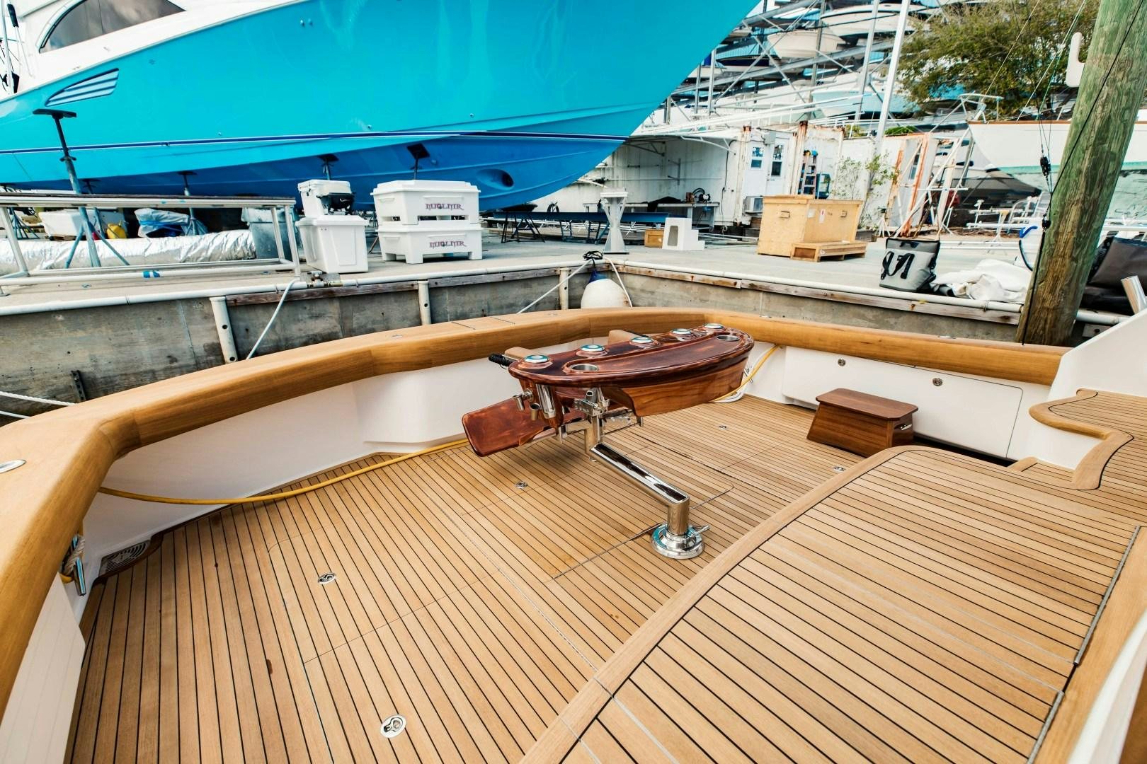 a deck with a deck and a boat on it aboard SHOE Yacht for Sale