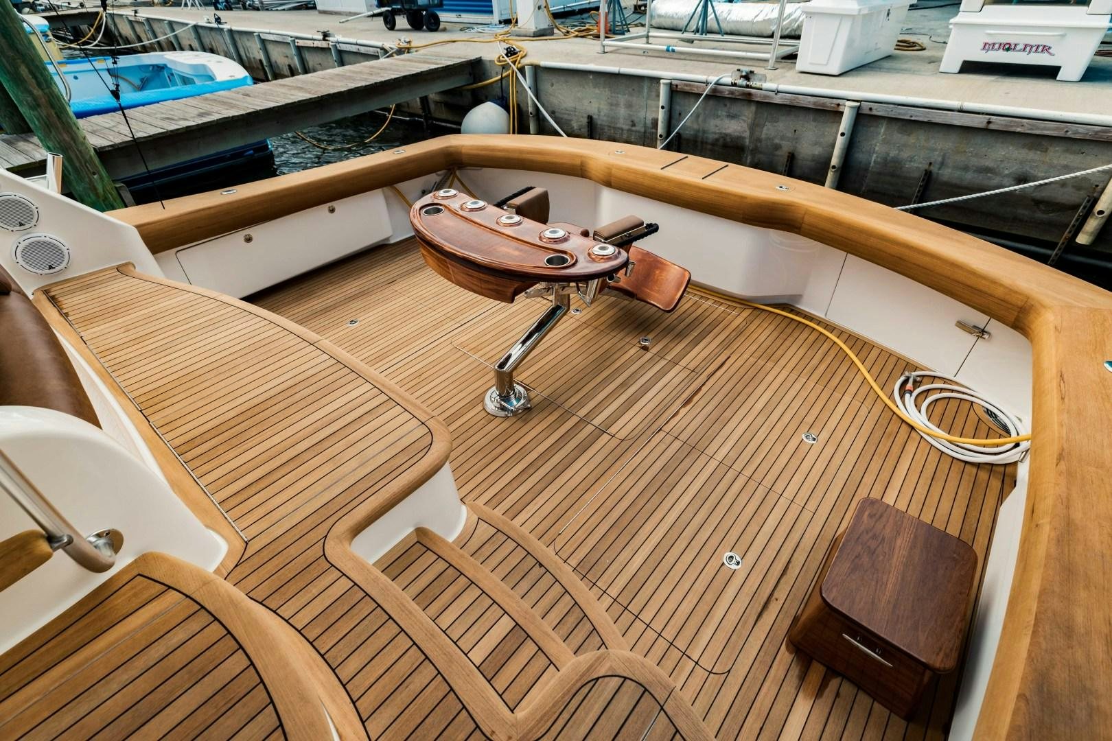 a boat on a wooden deck aboard SHOE Yacht for Sale
