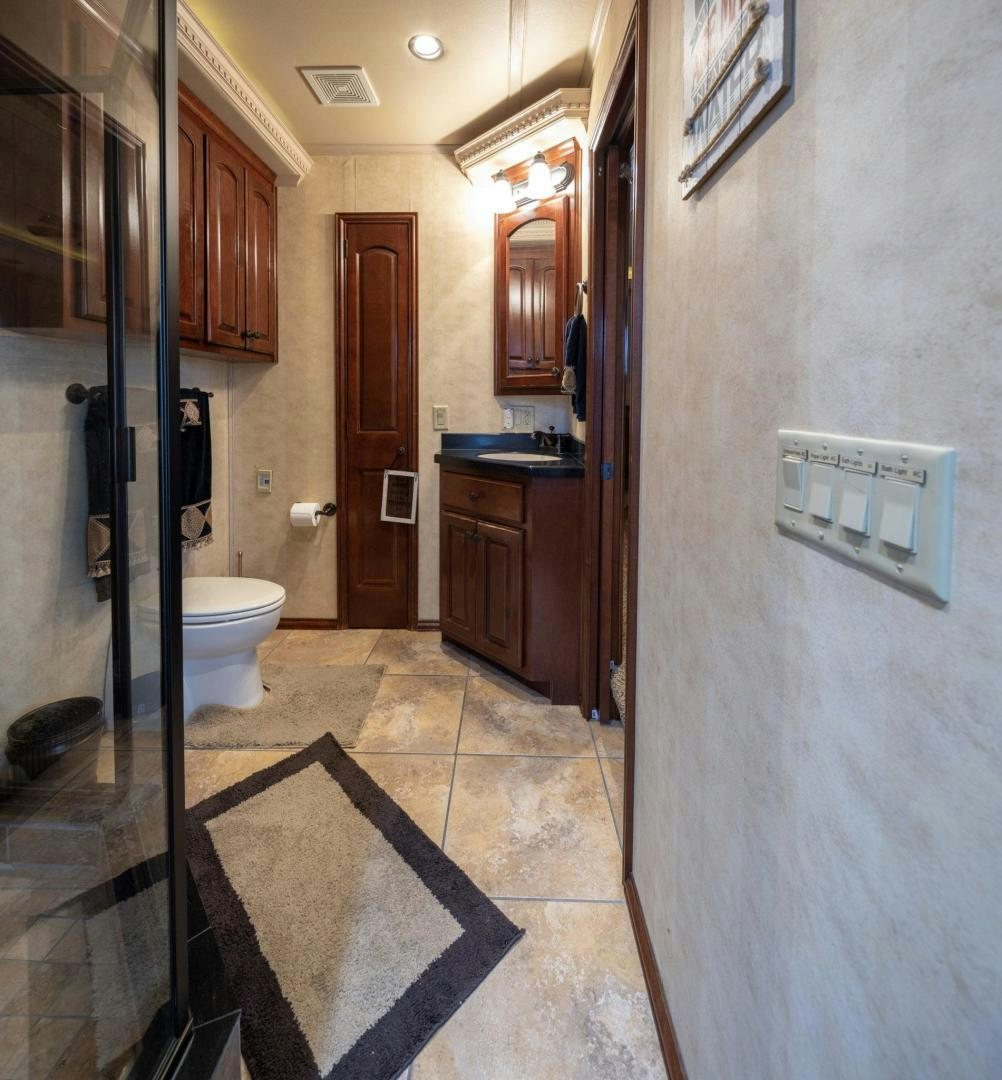 a bathroom with a sink and a toilet aboard KNOT TIDE DOWN Yacht for Sale