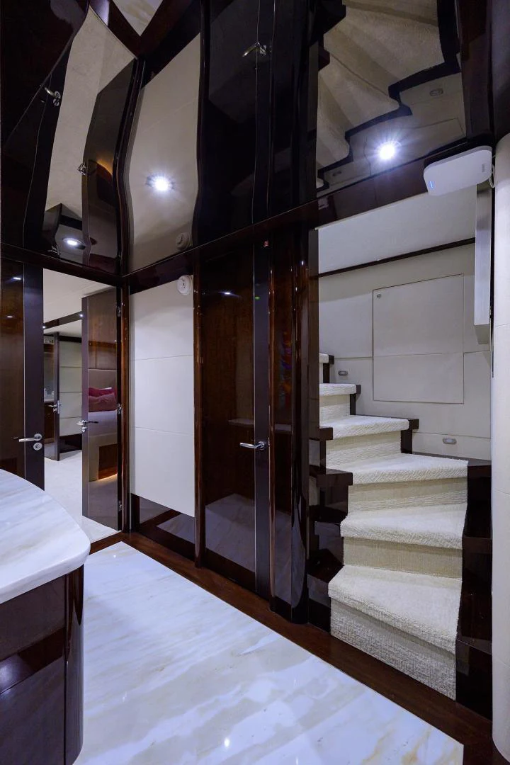 a room with a large mirror aboard PURE ROMANCE Yacht for Sale