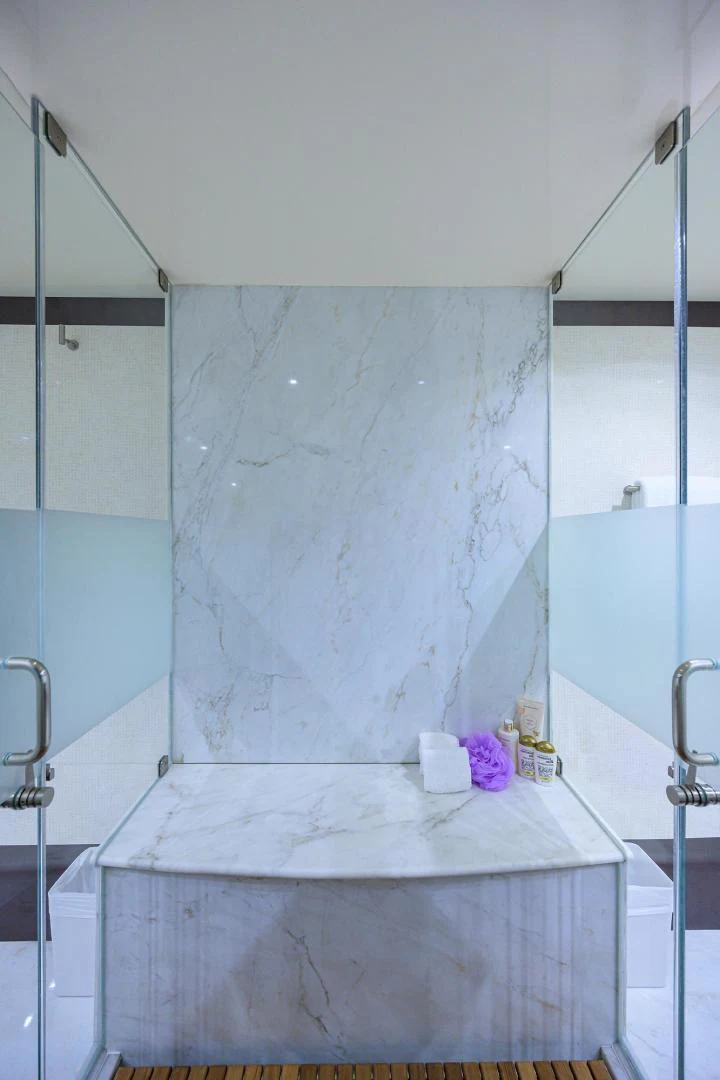 a bathroom with a sink and a mirror aboard PURE ROMANCE Yacht for Sale