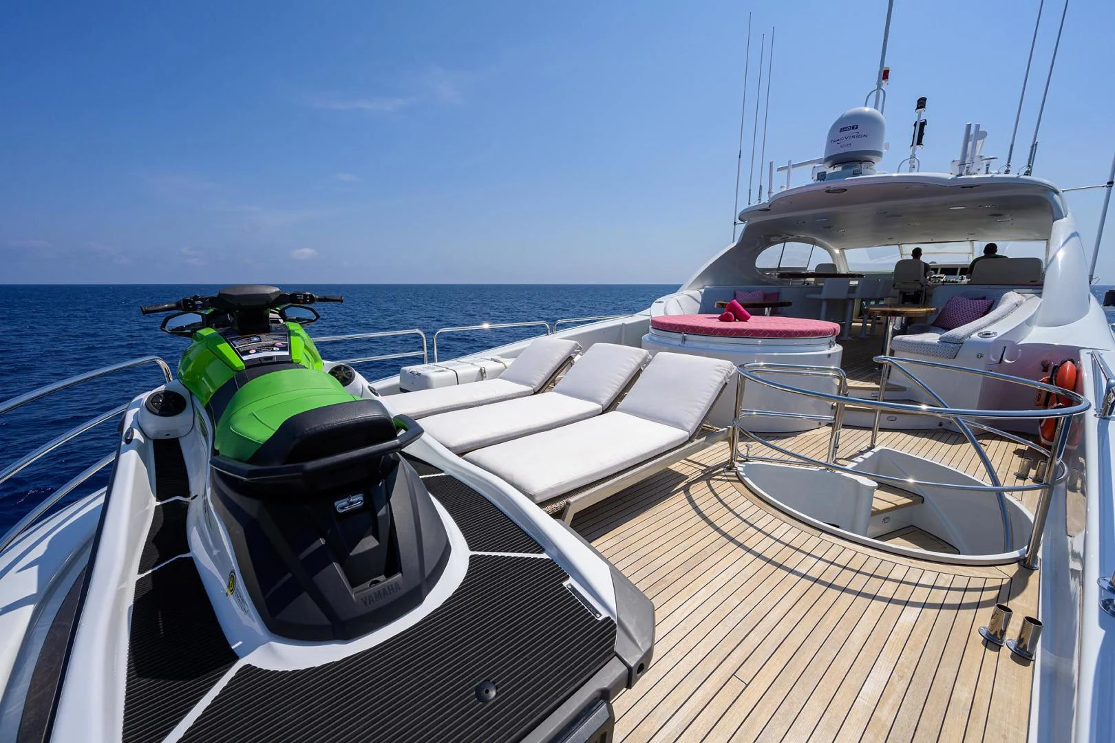 a boat with a green and white sail on the water aboard PURE ROMANCE Yacht for Sale