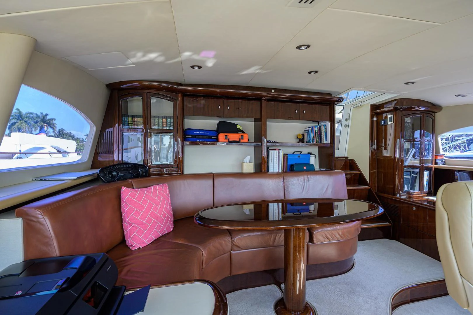 a living room with a couch and a television aboard PURE ROMANCE Yacht for Sale